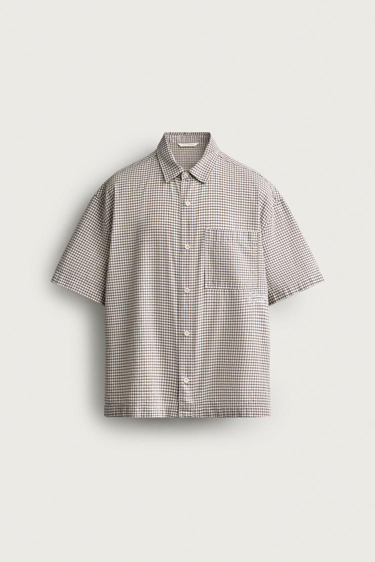 CAMISA RELAXED FIT CUADROS TEXTO