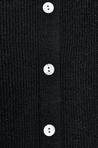 TOP RIB PEPLUM BOTONES - Negro de Zara