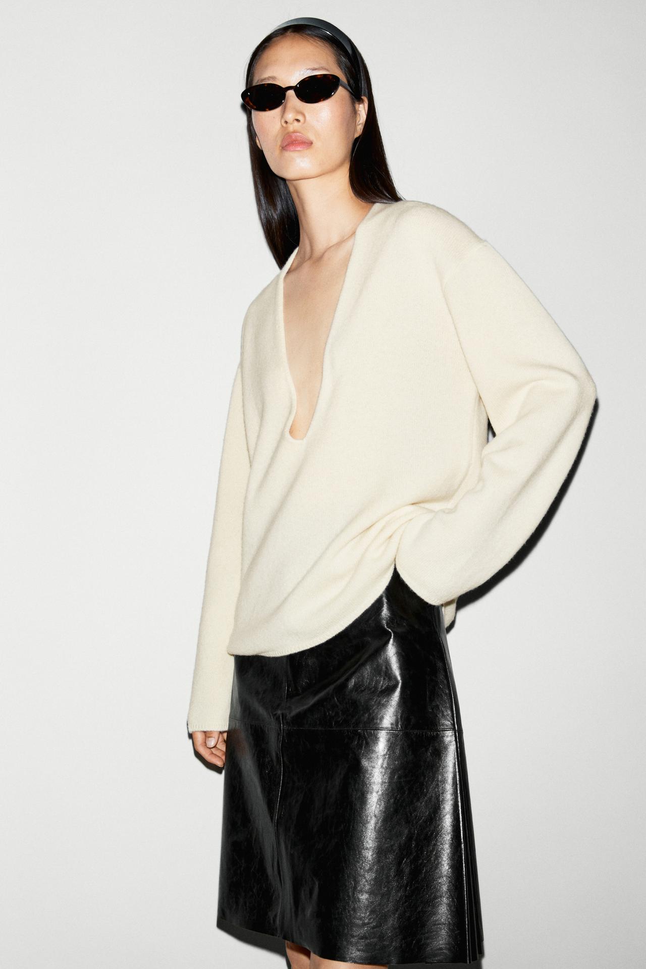 Long-line knit sweater with neckline detail — Tan marl