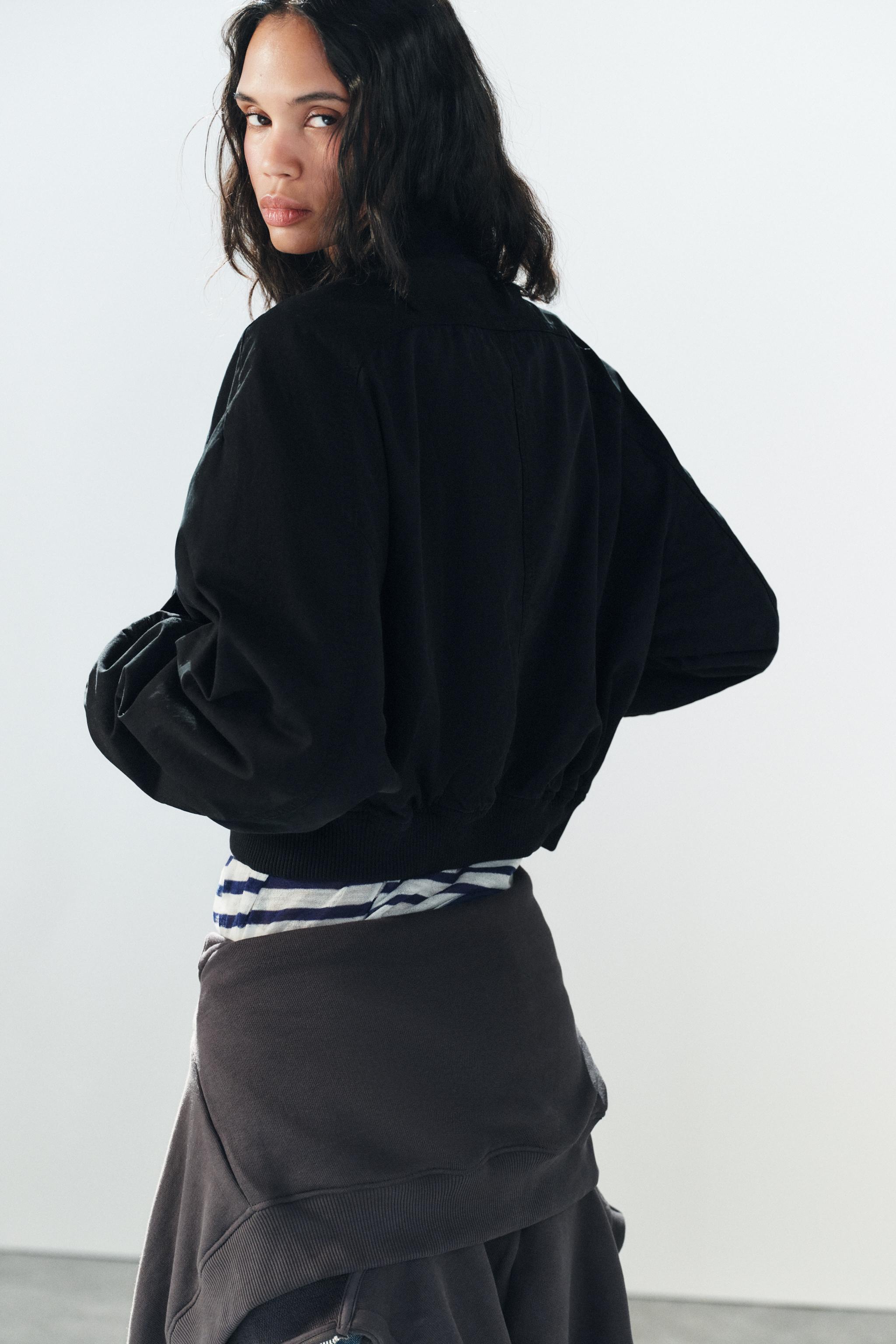 VESTE BOMBER À BAS ASYMÉTRIQUE