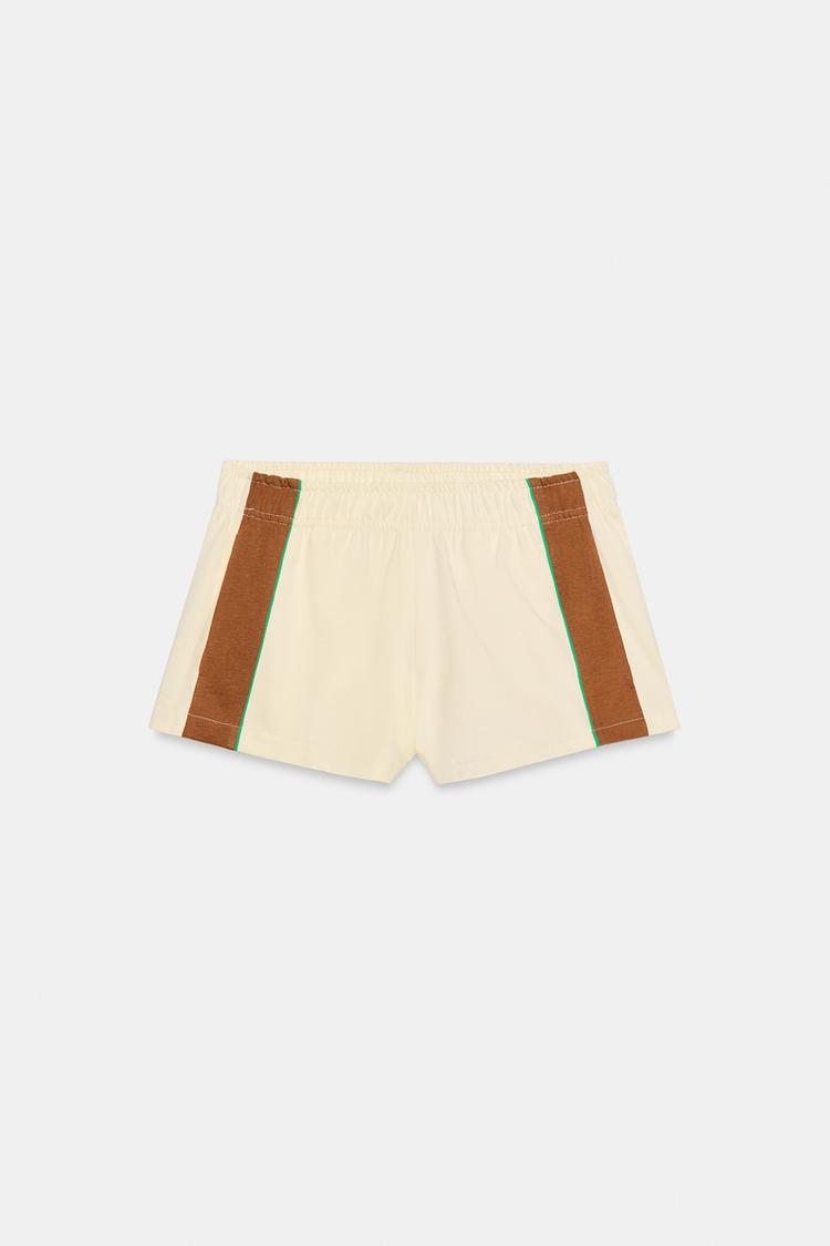 SHORTS MINI BANDAS LATERALES