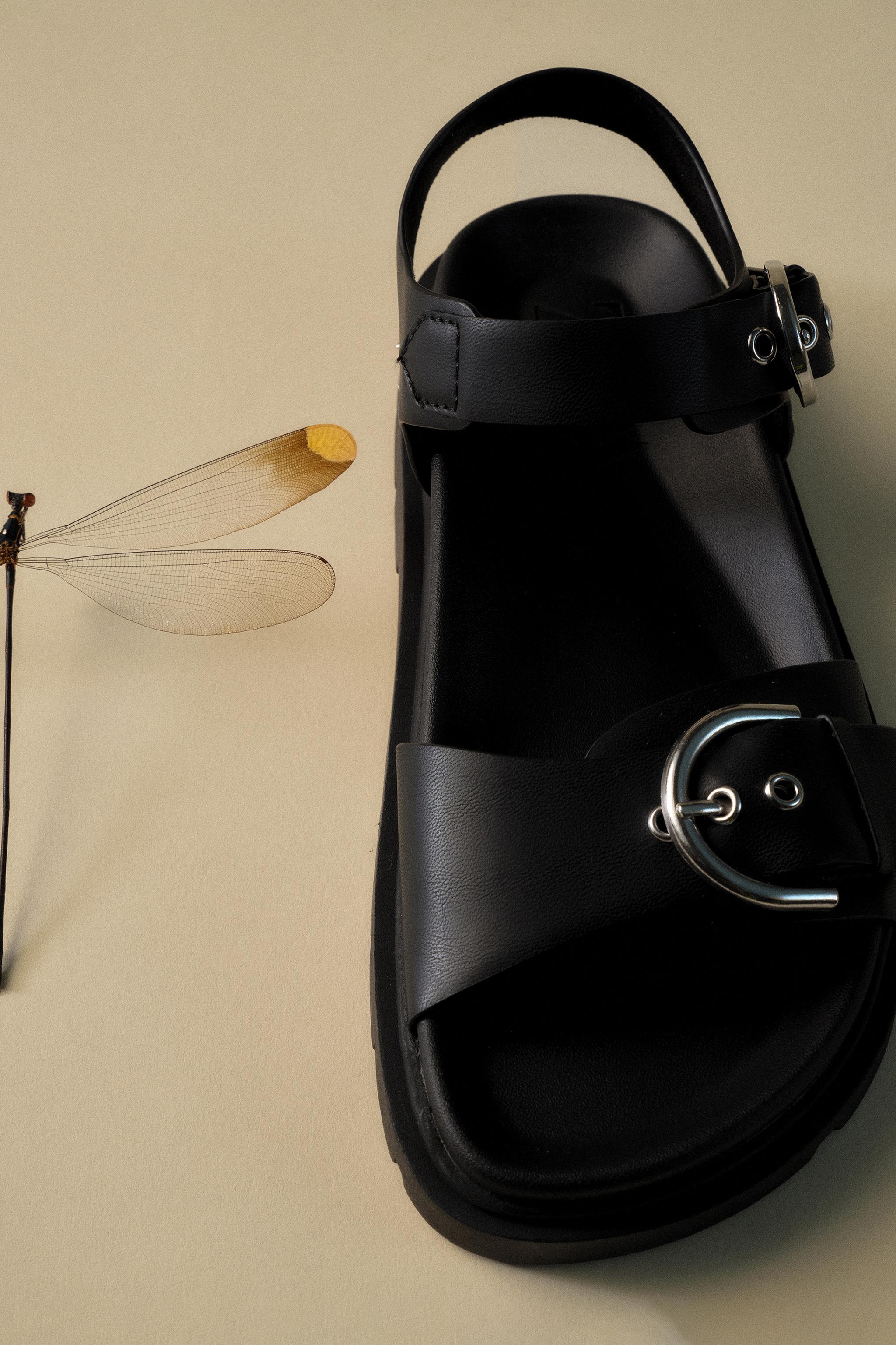 BUCKLED SANDALS — Black
