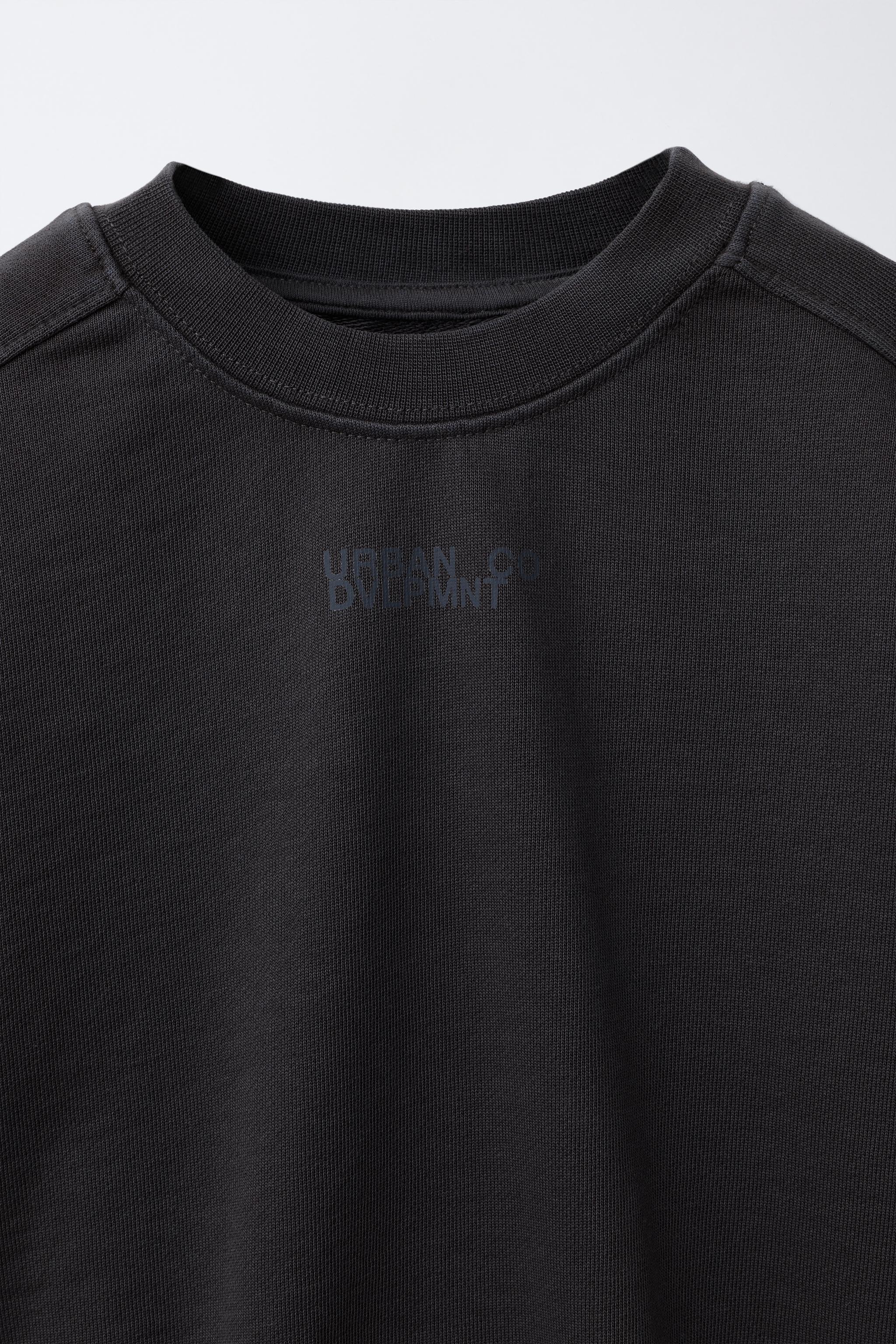 T-SHIRT EN MOLLETON AVEC INSCRIPTION