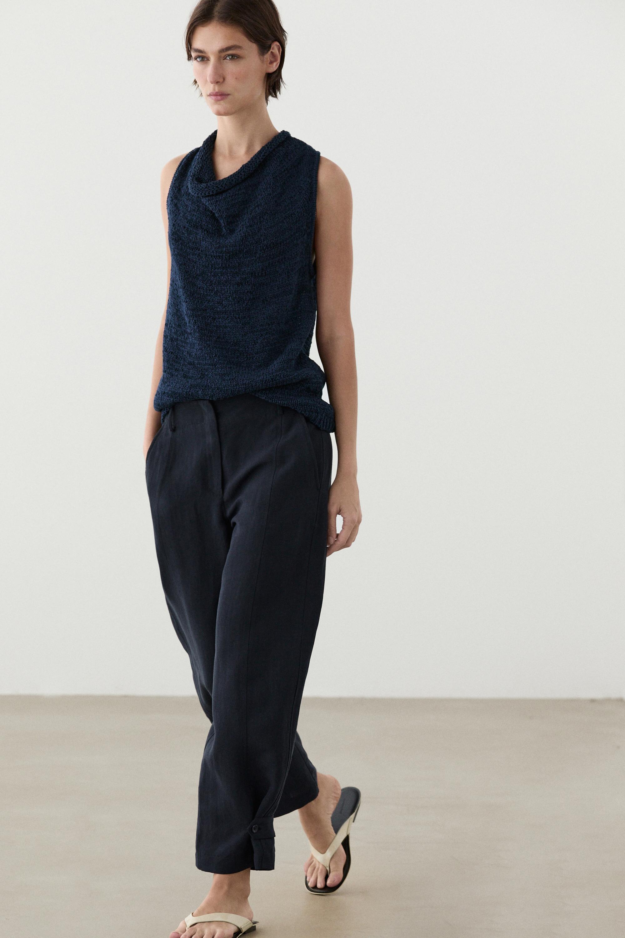 Flowing linen blend pants with buttoned tab detail