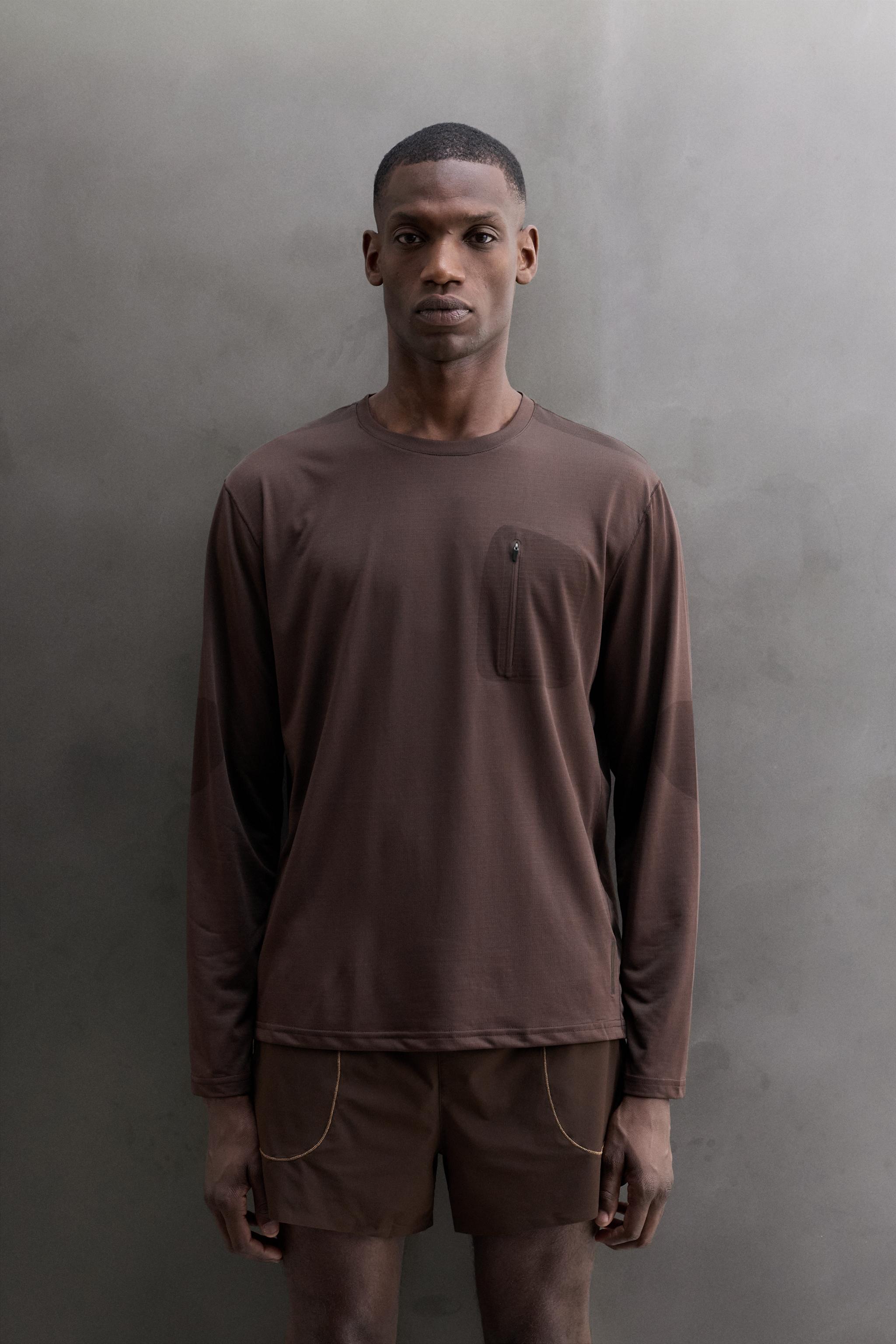 T-SHIRT TECHNIQUE À MANCHES LONGUES AVEC POCHE