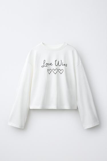 CAMISETA ESRAMPADO CORAZONES - Blanco roto de Zara - Imagen 0