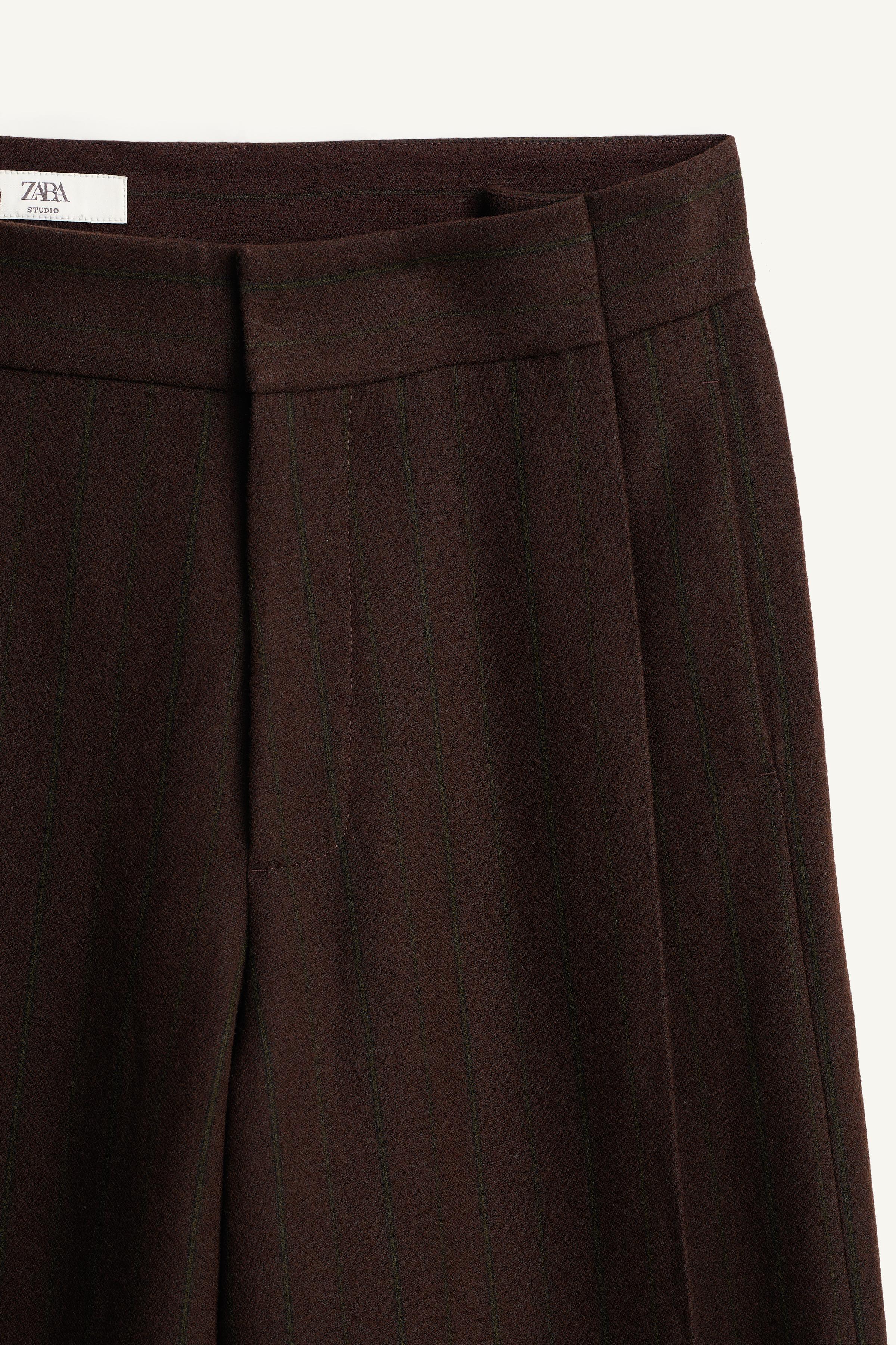 LIMITED EDITION STRIPED WIDE-LEG PLEATED PANTS