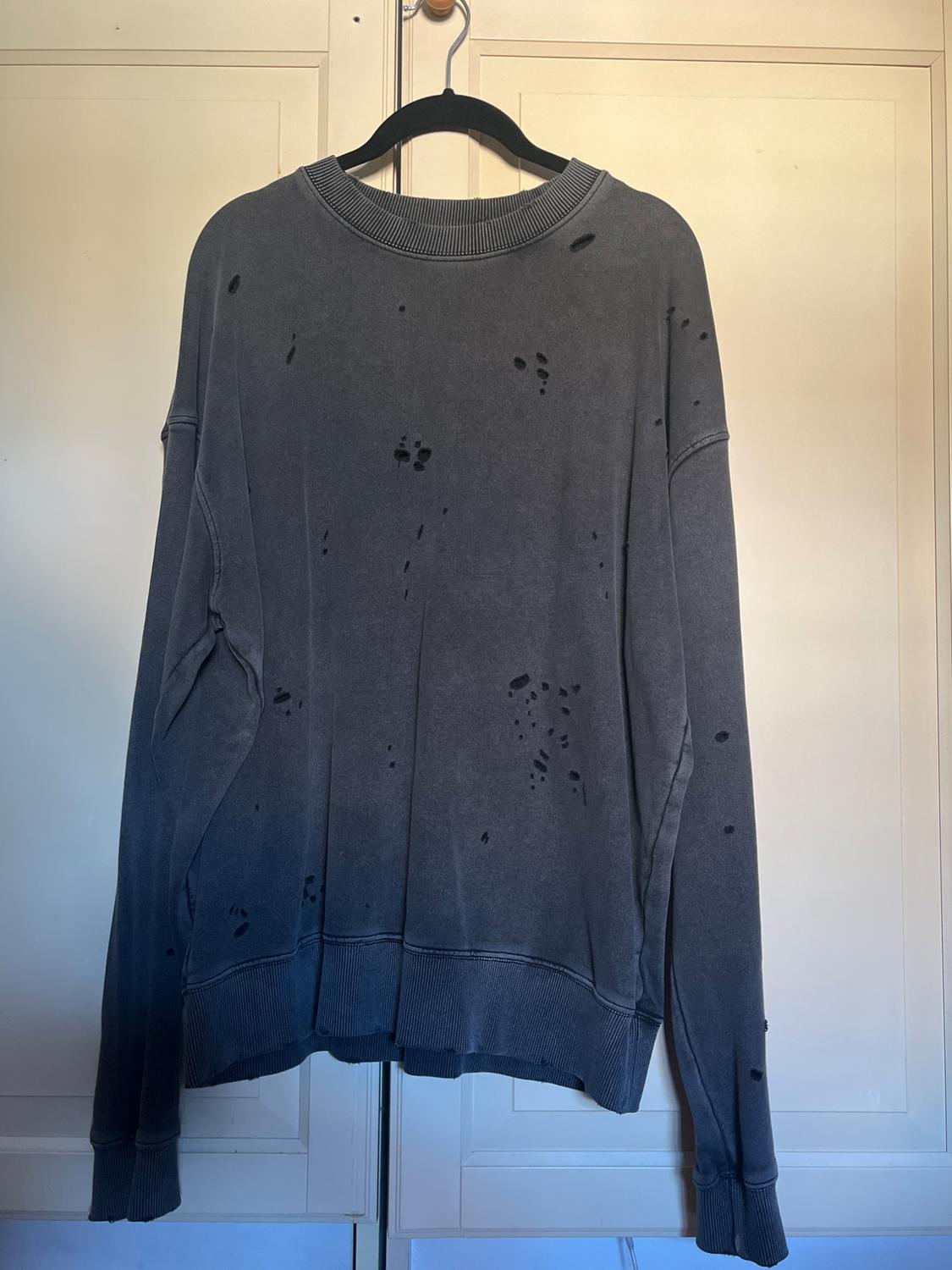 FADED SWEATSHIRT WITH RIPS