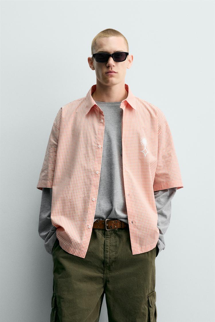 Camisa de corte boxy con estampado de eslogan 2