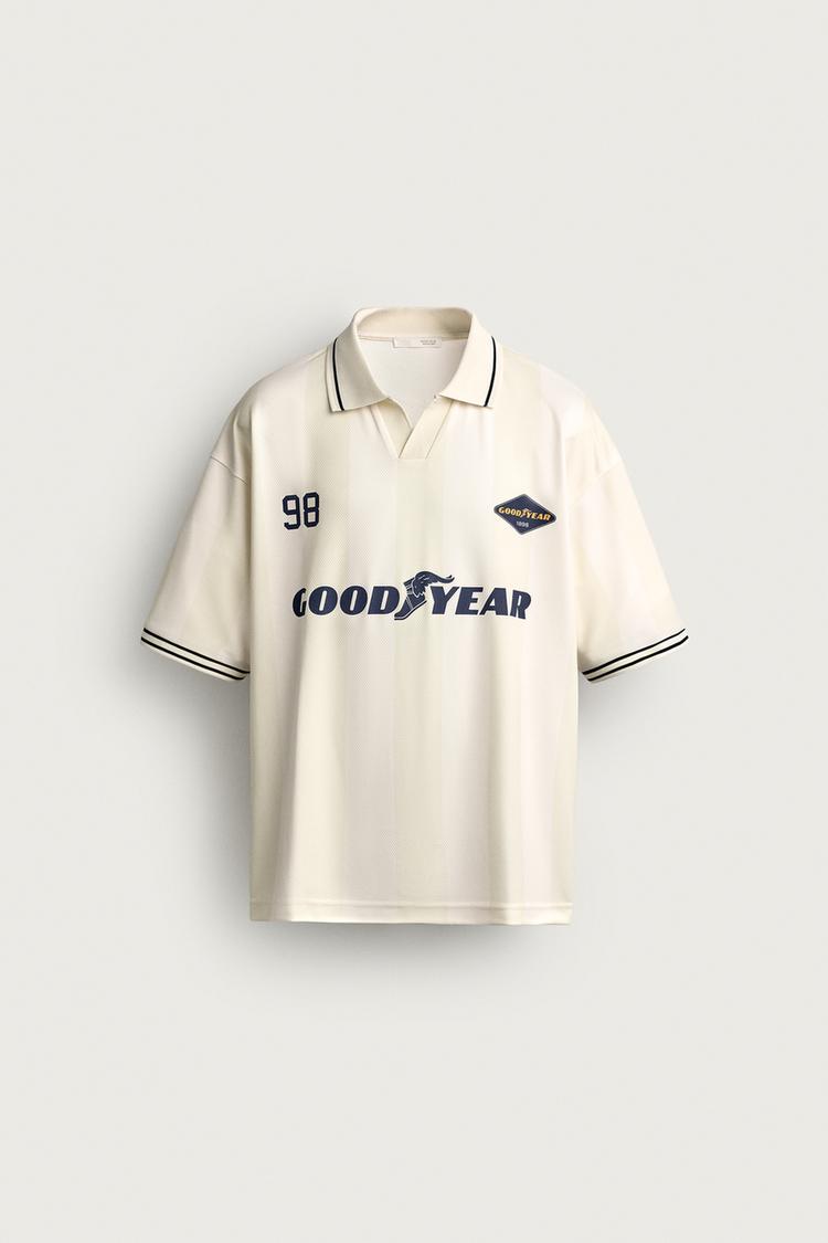 Polo retro graficos goodyear