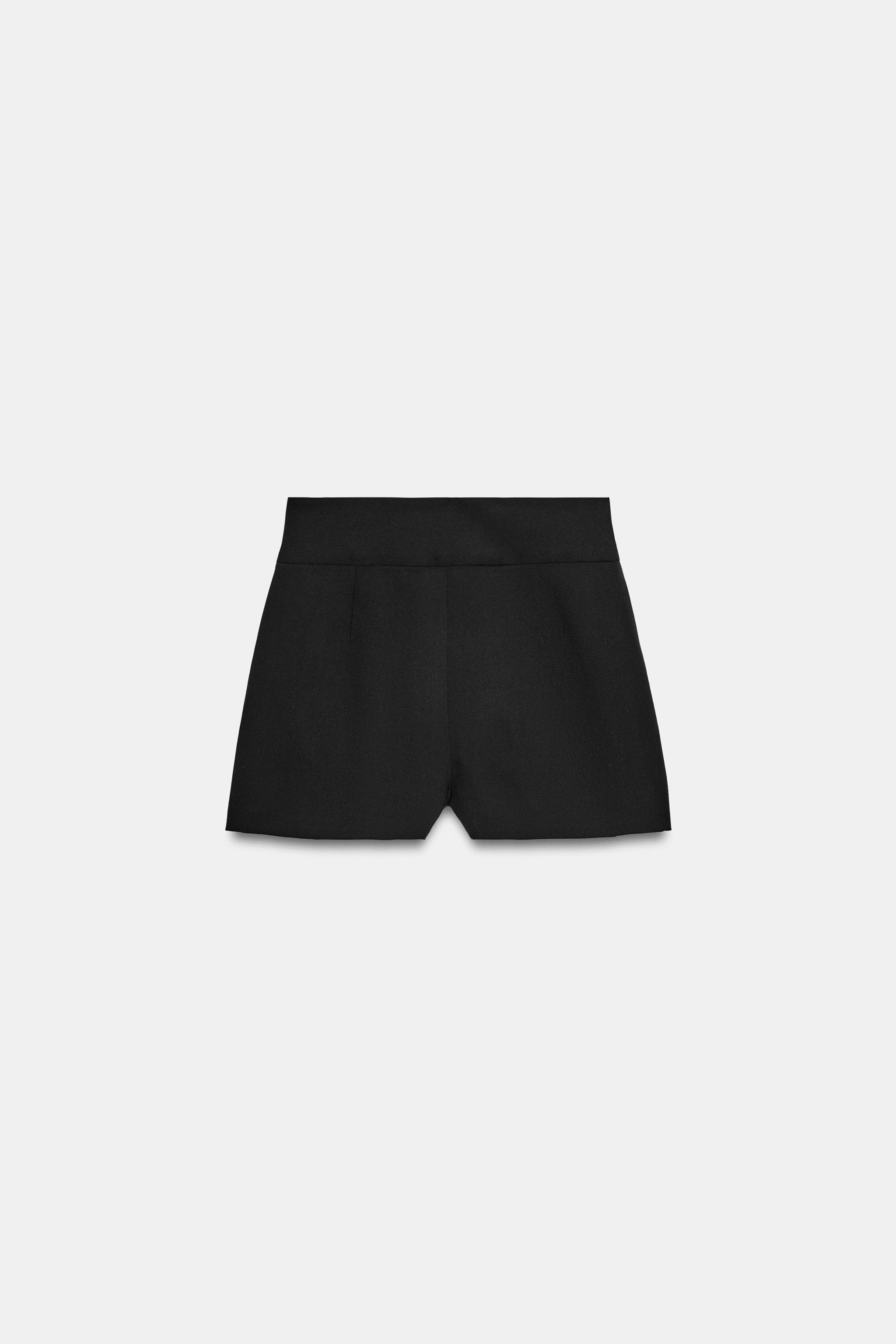 SHORT PLIS MATIÈRE SYNTHÉTIQUE