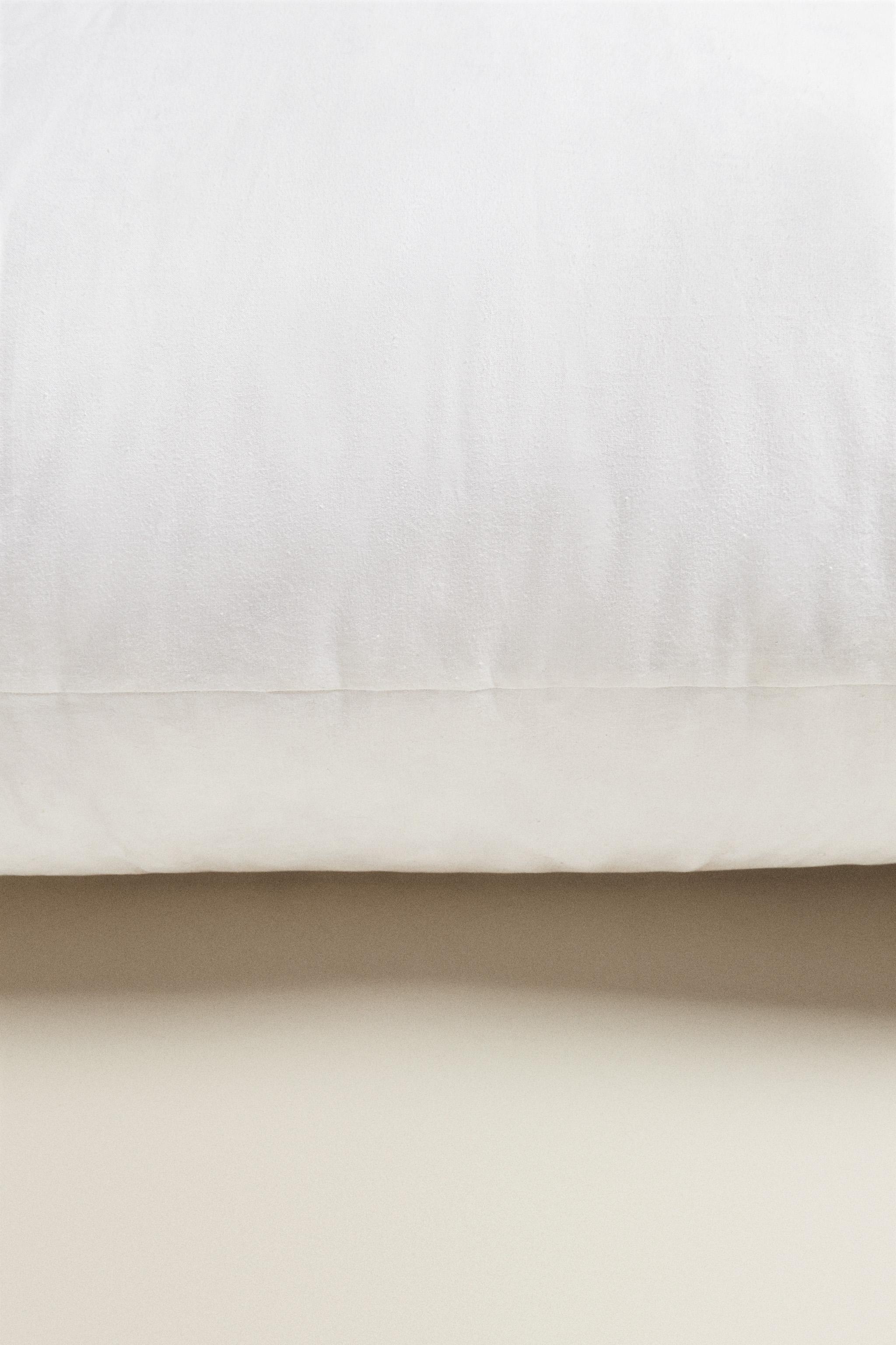 Zara white feather discount cushion