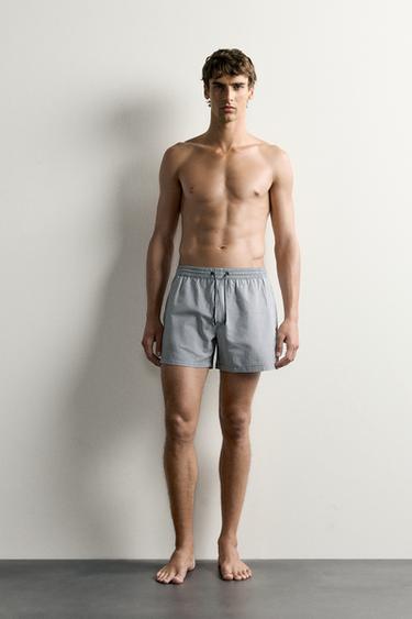 MITTELLANGE SEERSUCKER-BADESHORTS - Marineblau von Zara - Bild 0
