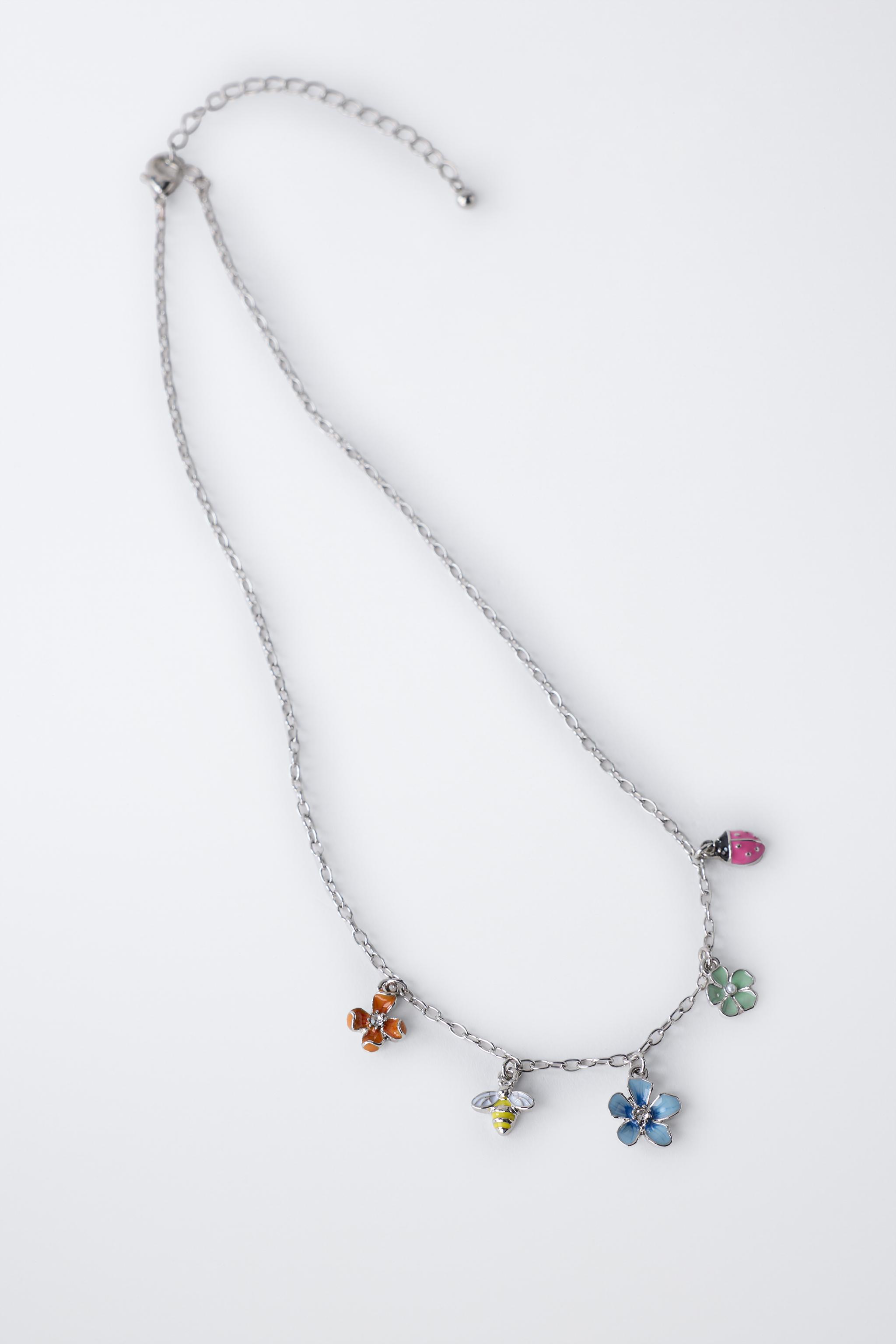 LOT COLLIER ET BAGUE FORMES