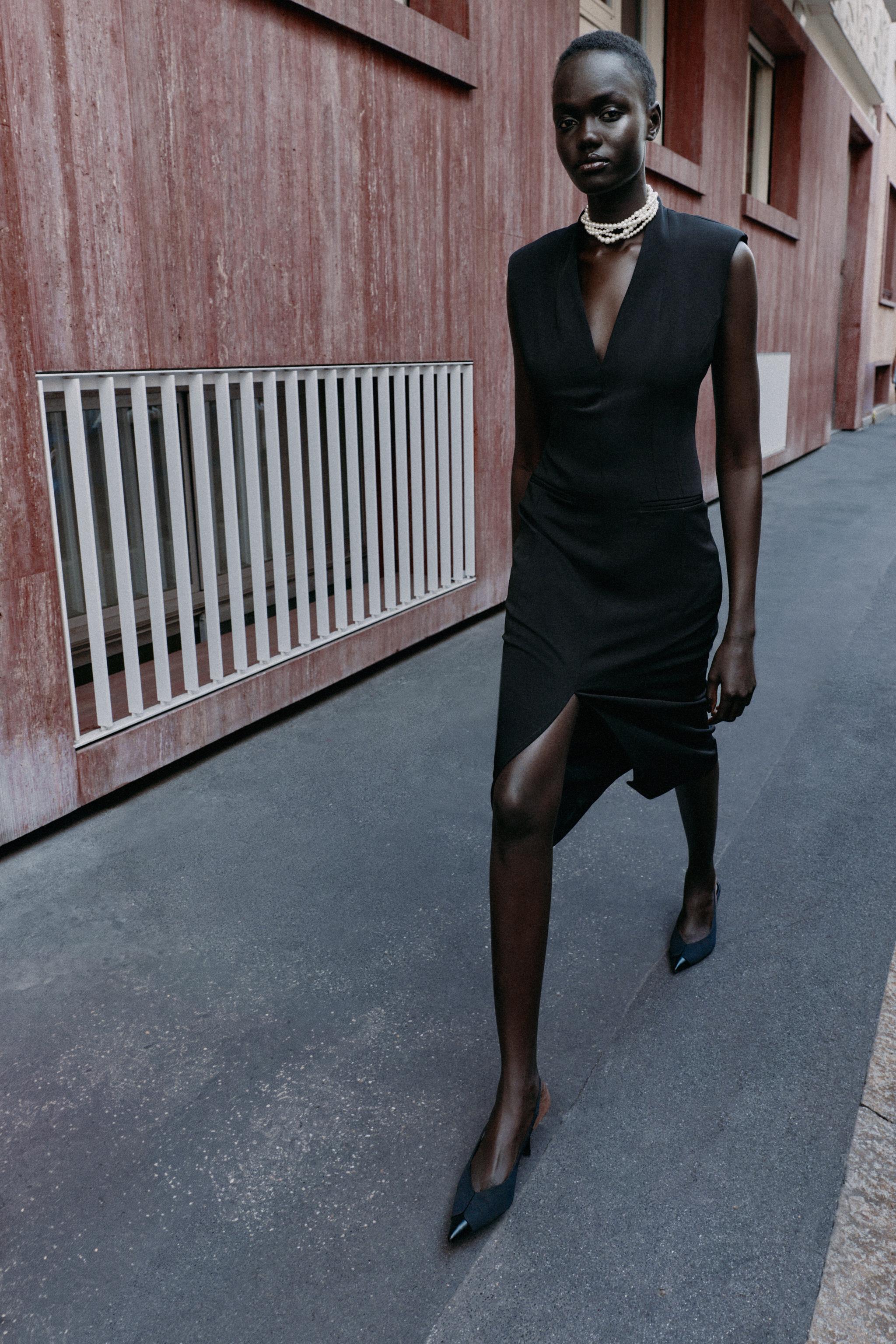 MIDI SLEEVELESS DRESS