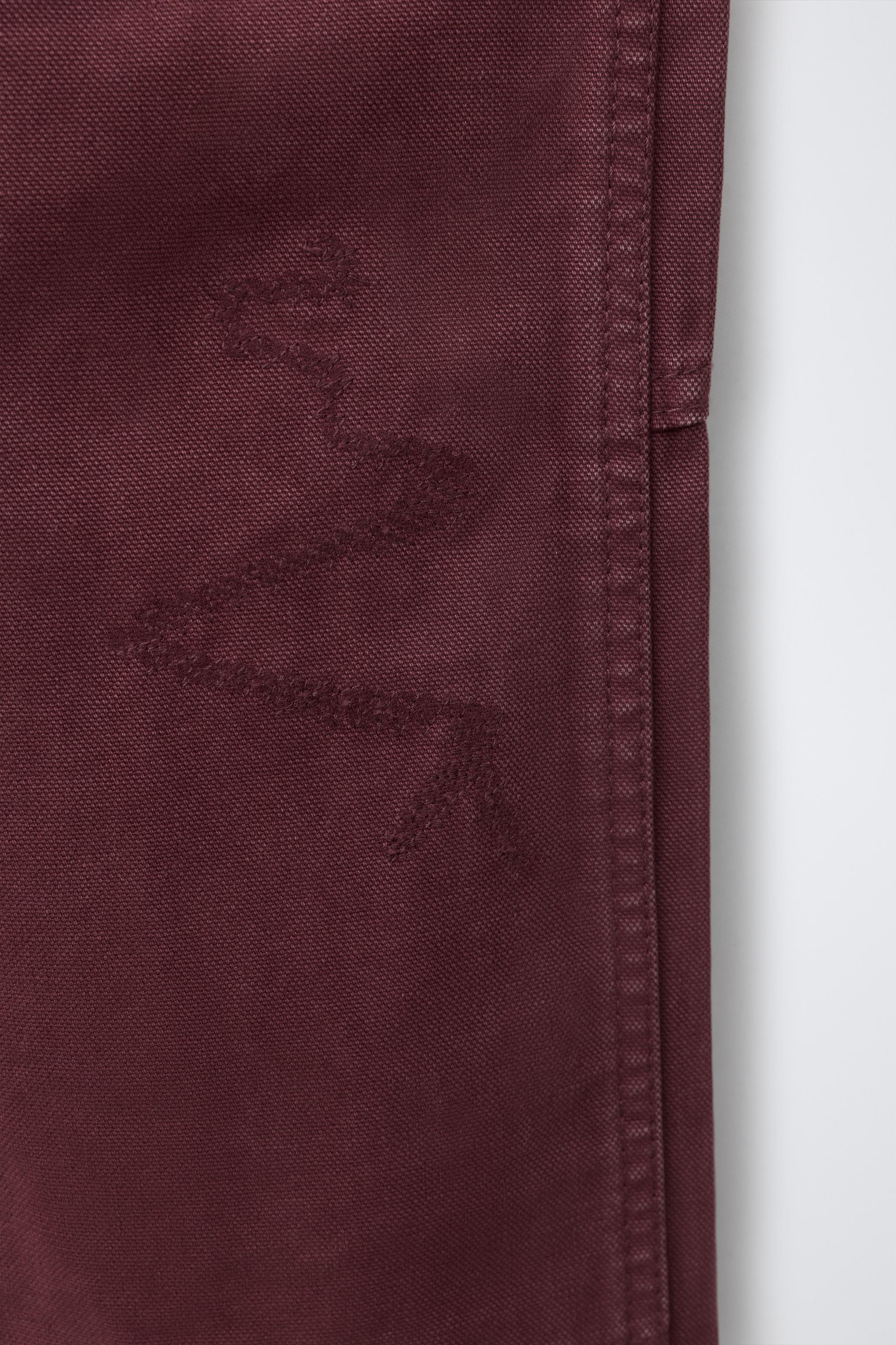 DISTRESSED CARPENTER JEANS