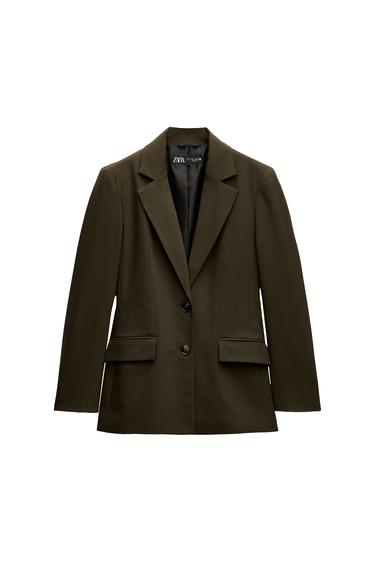 Front view of an olive green blazer with lapels and two buttons, side pockets with flaps.