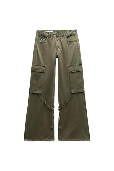 Green wide-leg cargo pants with large side pockets, on a white background.