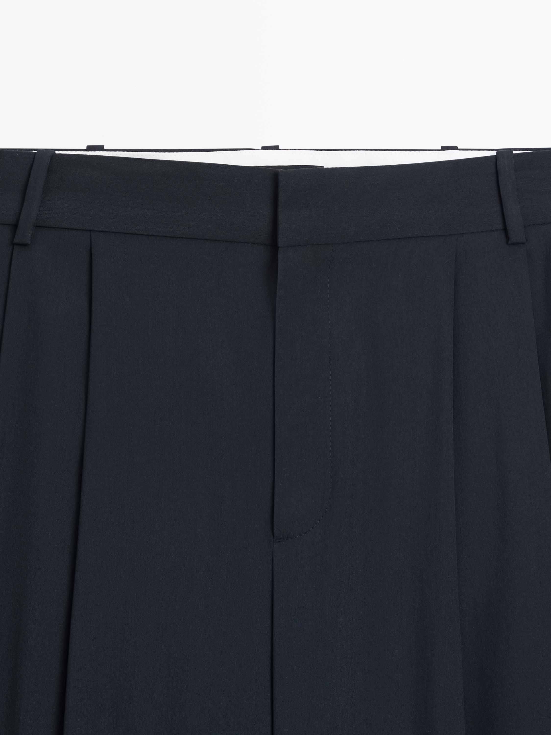 Pleated wool blend trousers