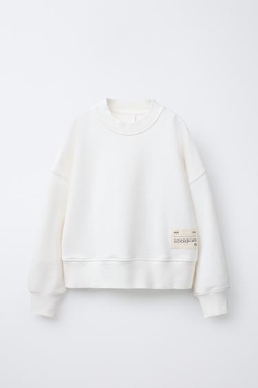 SWEAT À ÉTIQUETTE - Écru de Zara - Image 0