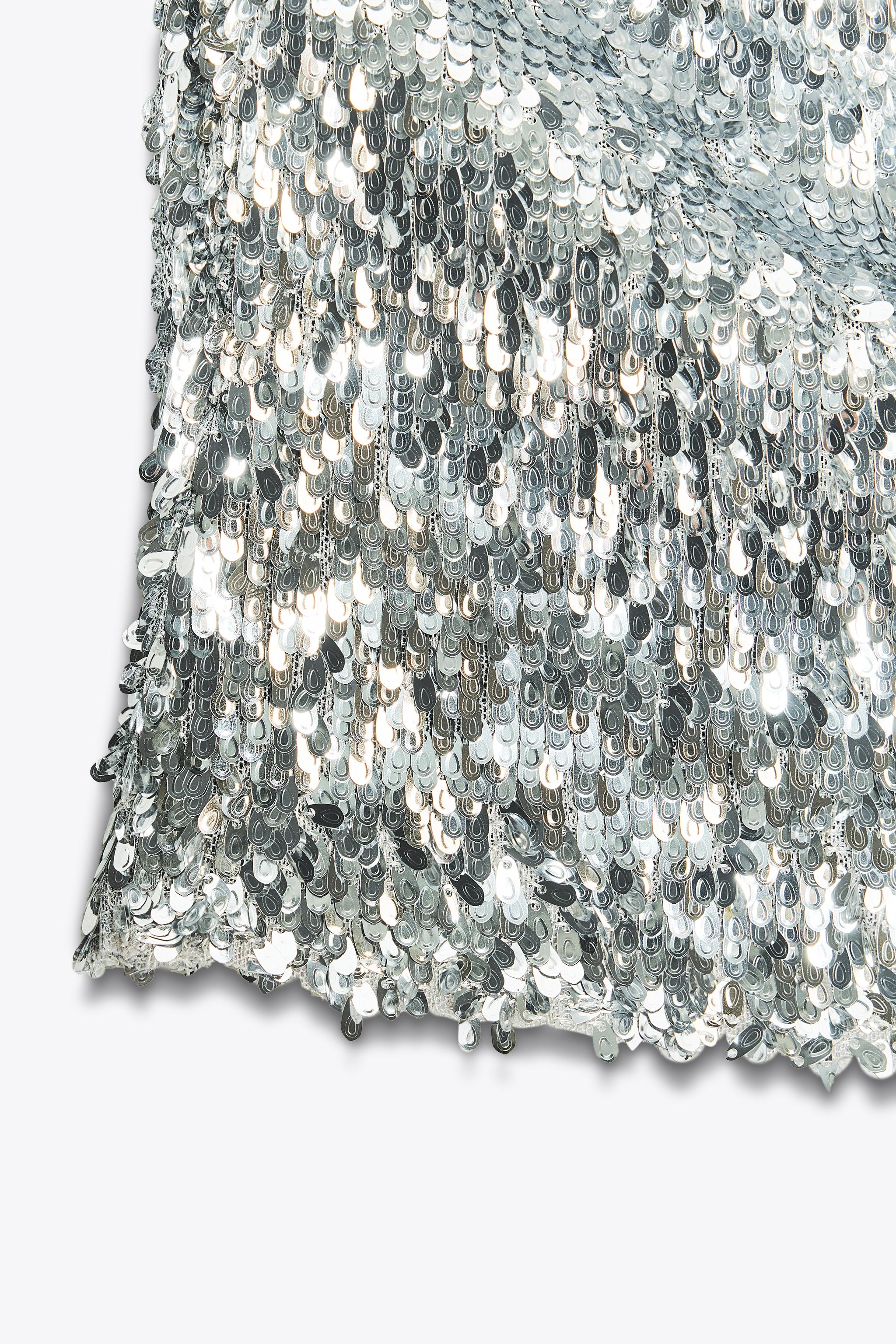 TOP HALTER À PAILLETTES