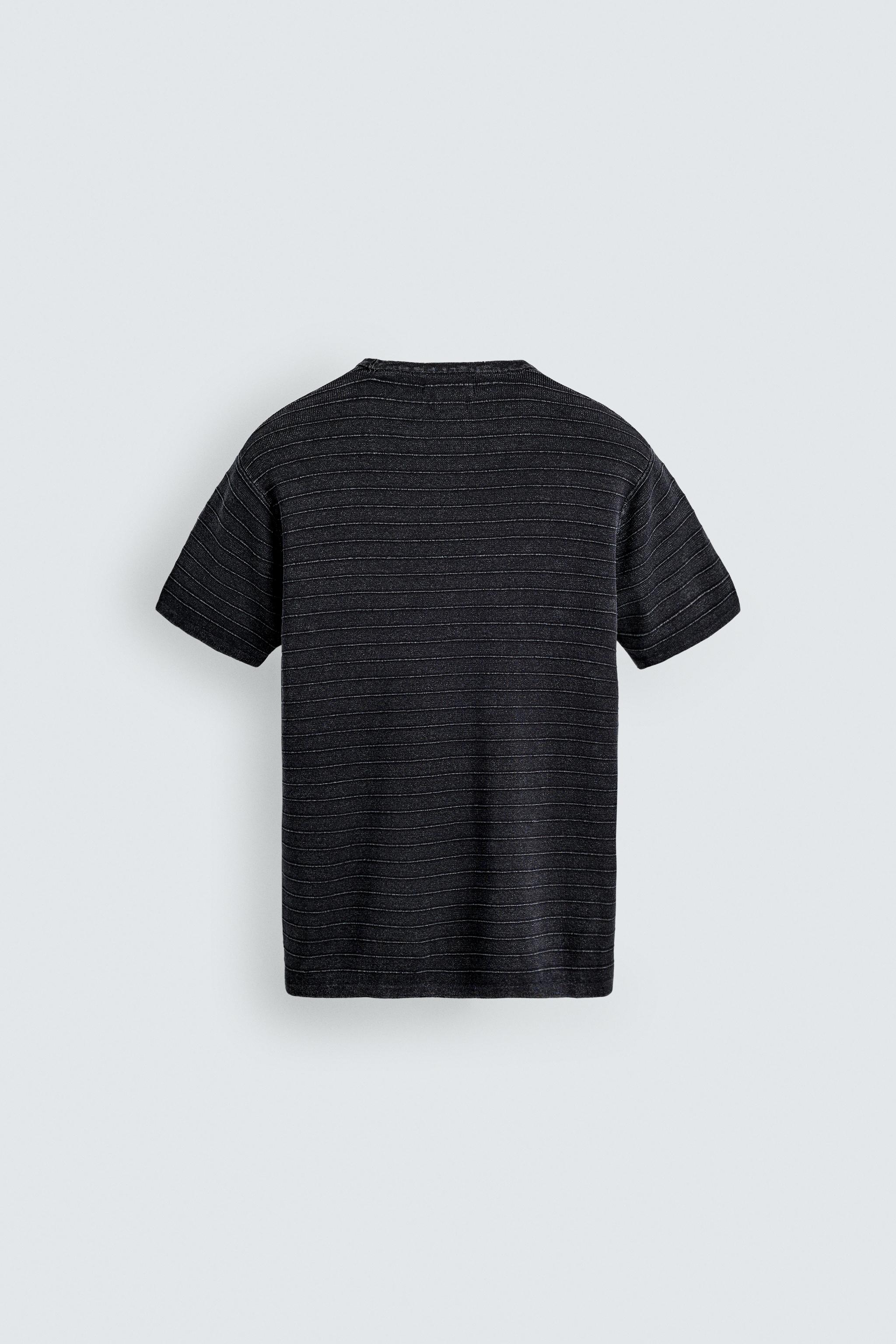 T-SHIRT EN MAILLE STRUCTURÉE DÉLAVÉE