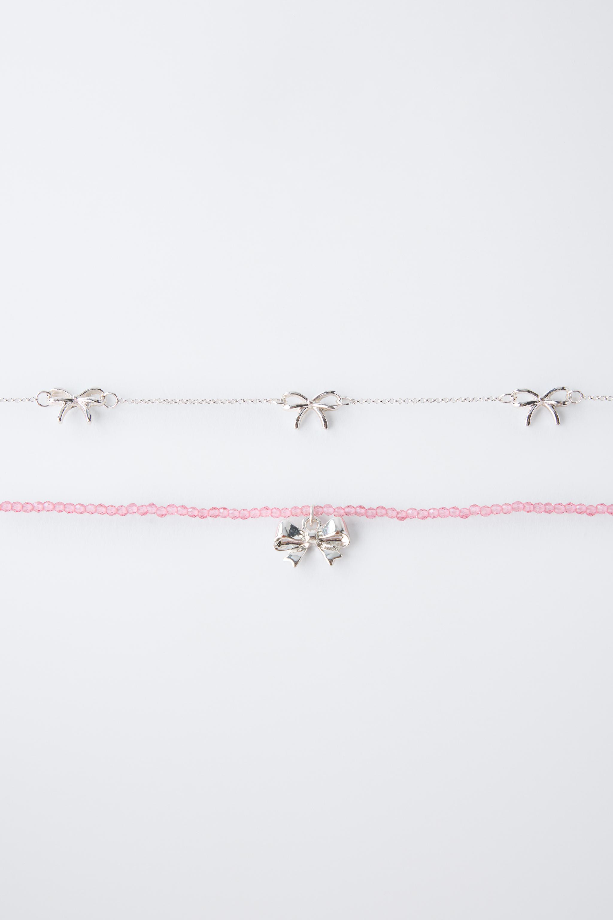 LOT DE DEUX COLLIERS À NŒUDS