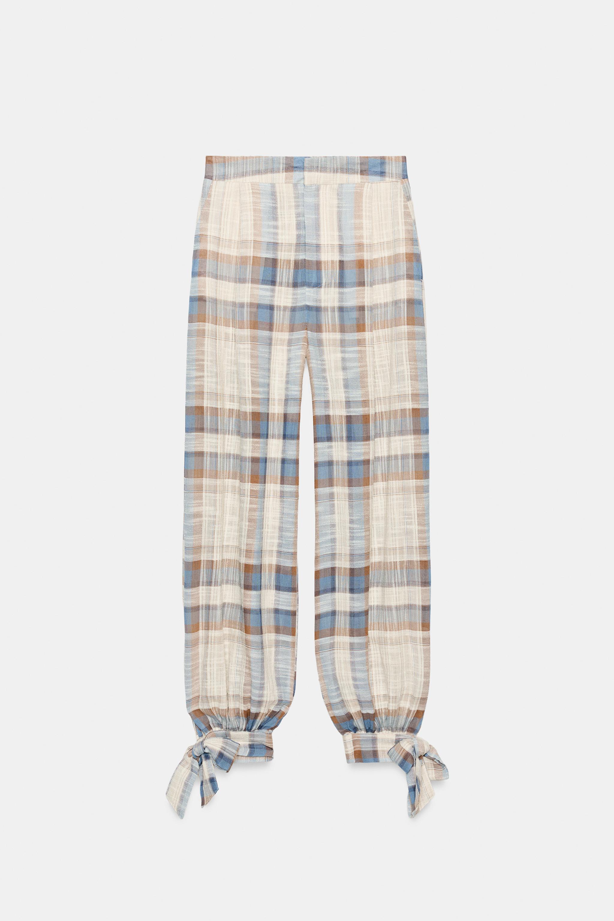 PANTALON BOUFFANT À LACETS ET CARREAUX