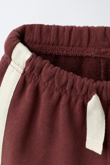 PANTALON EN MOLLETON À BANDE LATÉRALE - Grenat de Zara - Image 2
