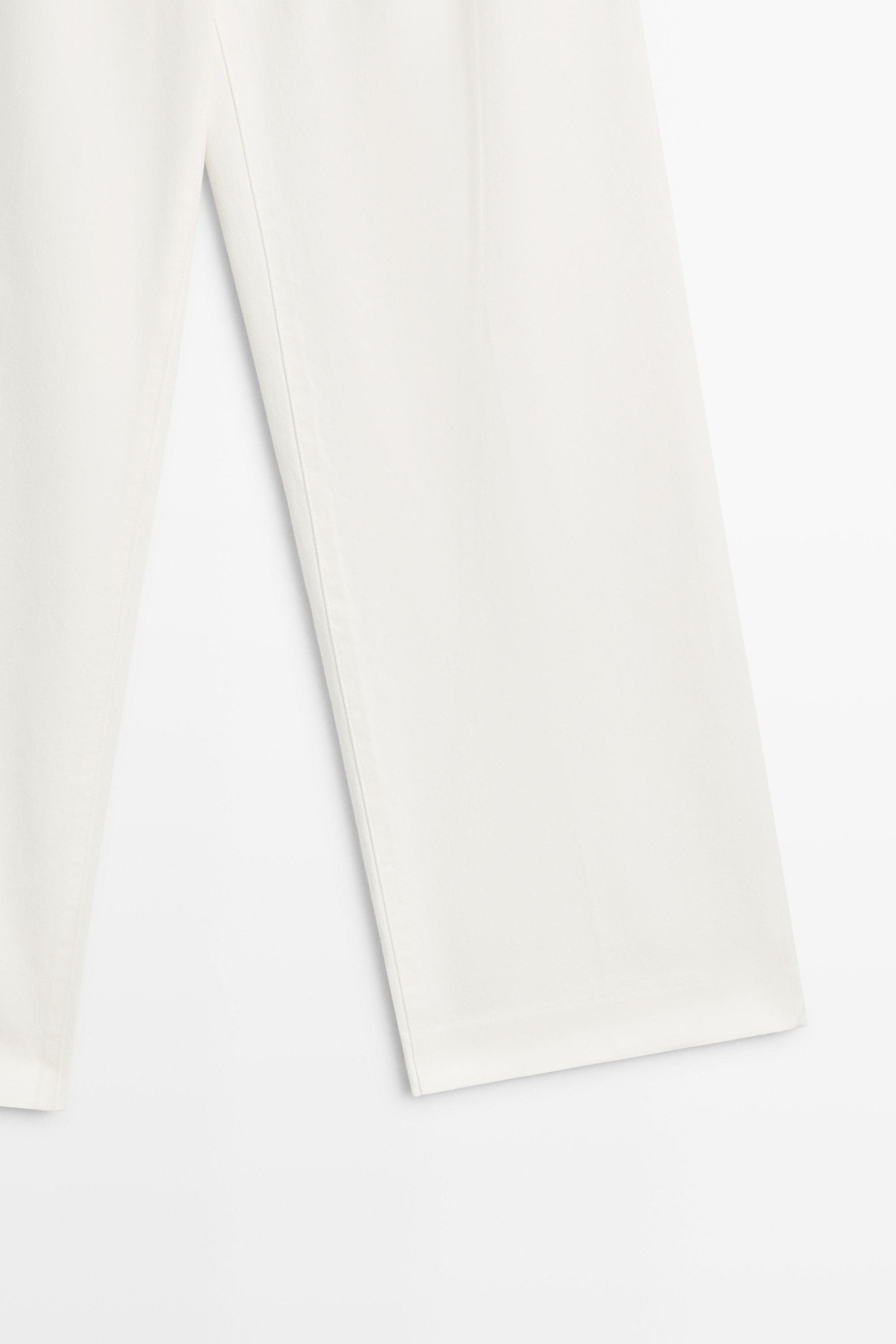 Pantalon wide leg taille basse à pinces