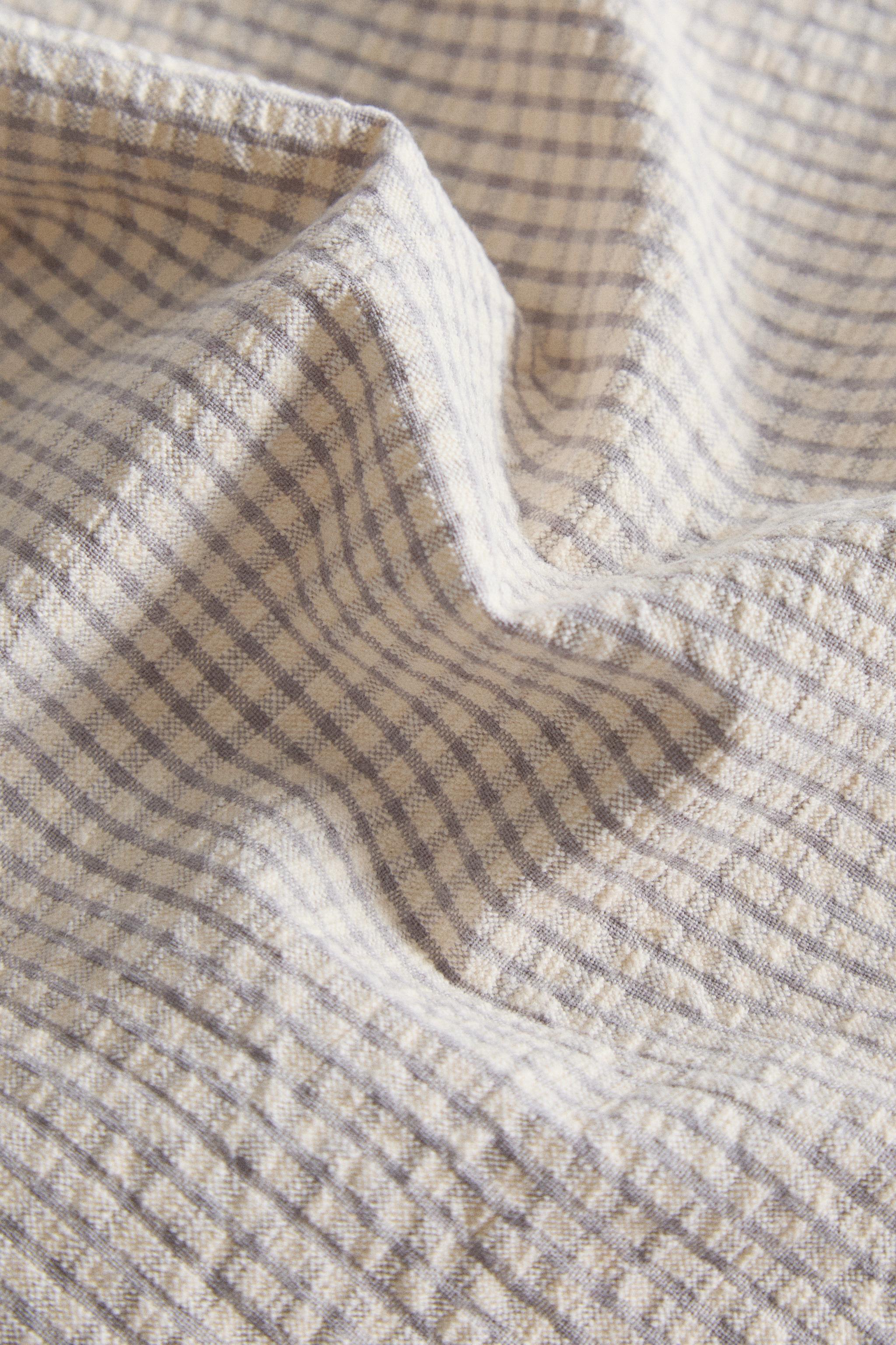 LOT DE SERVIETTES DE TABLE COTON BRODERIE ONDES NOËL (LOT DE 2)