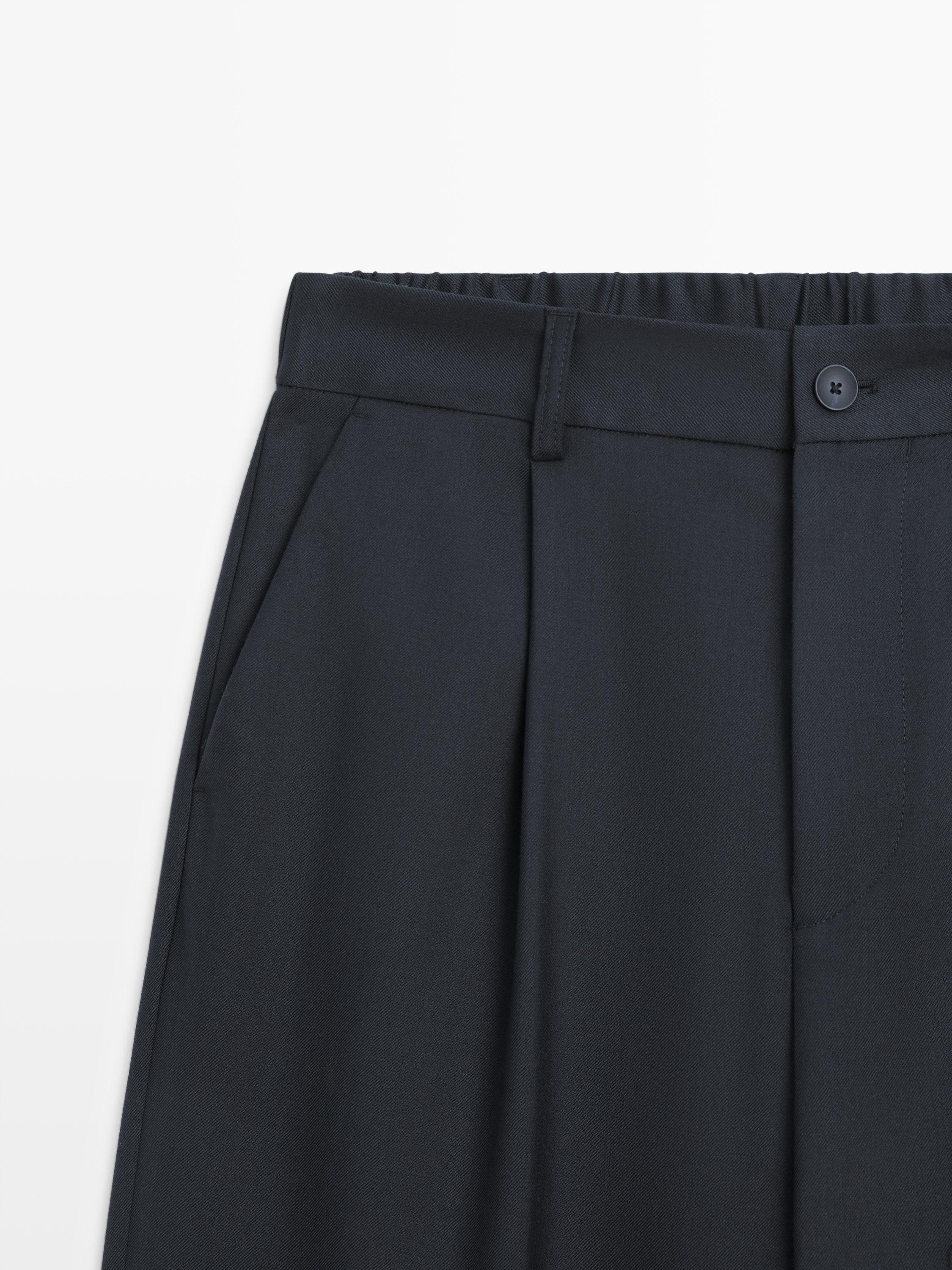 Relaxed fit wool blend trousers with darts