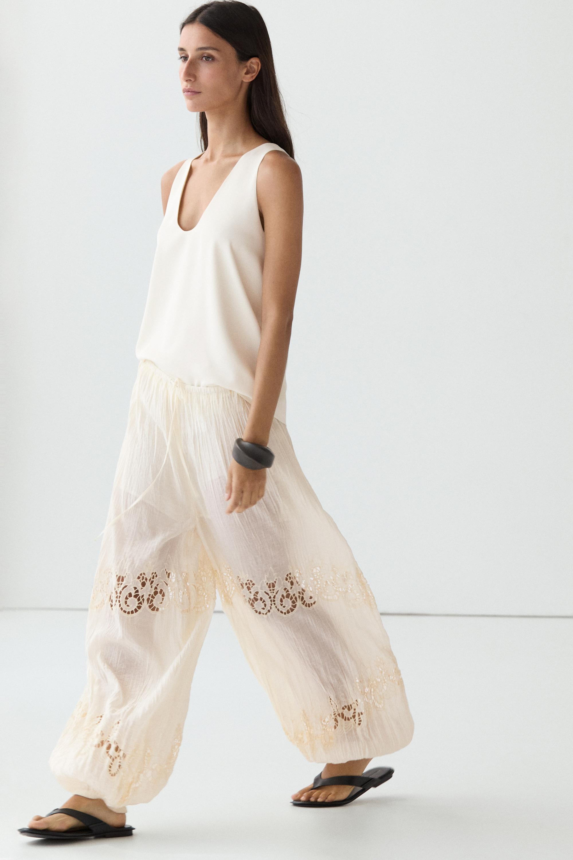 Flowing sarouel trousers with embroidered detail