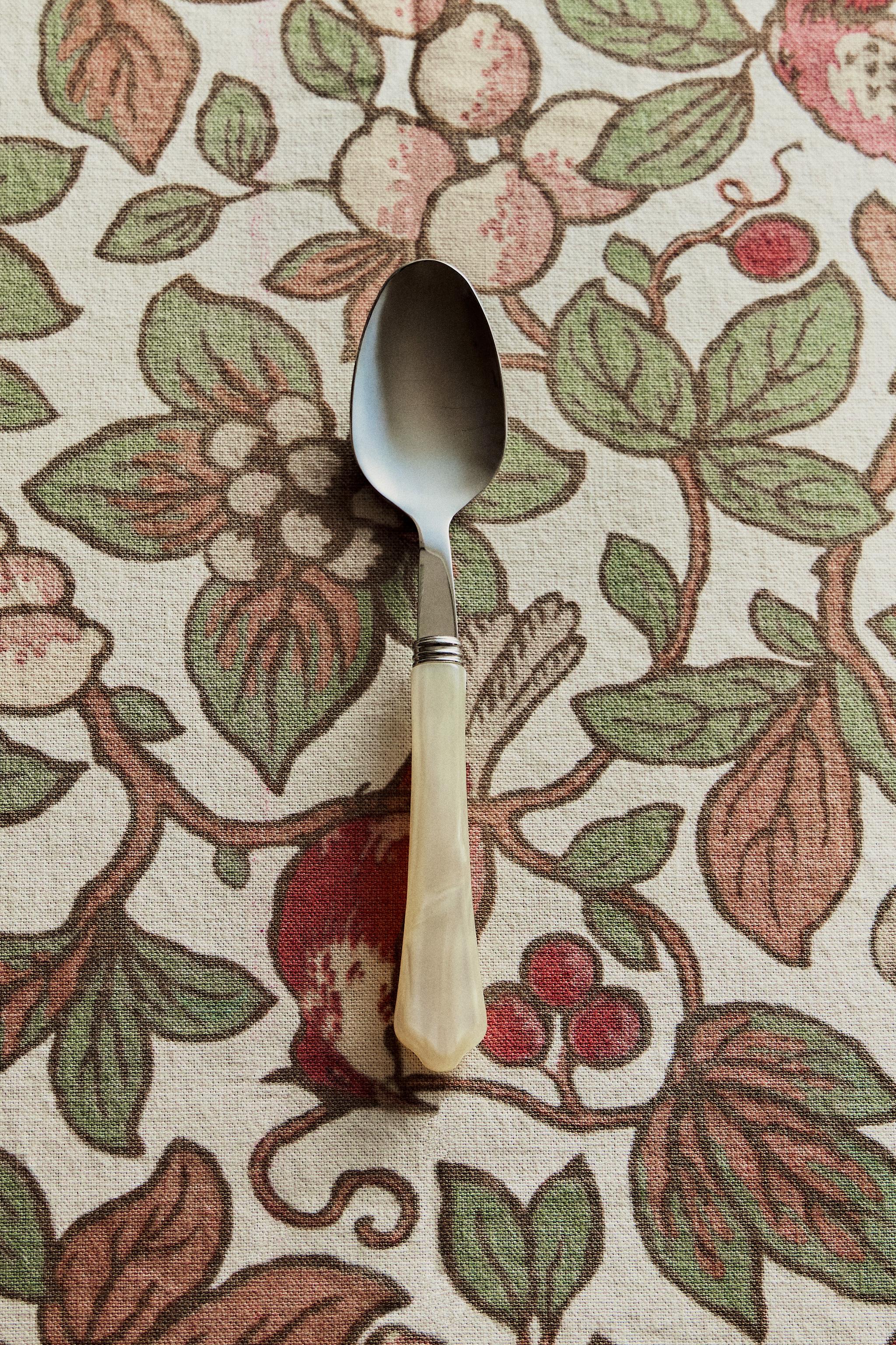 ENSEMBLE DE 4 COUVERTS MANCHE EFFET NACRÉ