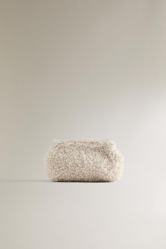 TROUSSE DE TOILETTE FAUSSE FOURRURE