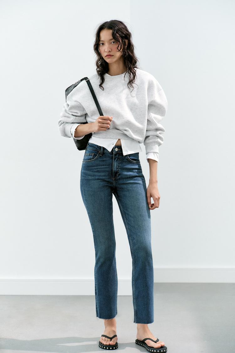 JEANS ACAMPANADOS DE CINTURA ALTA CORTADOS TRF