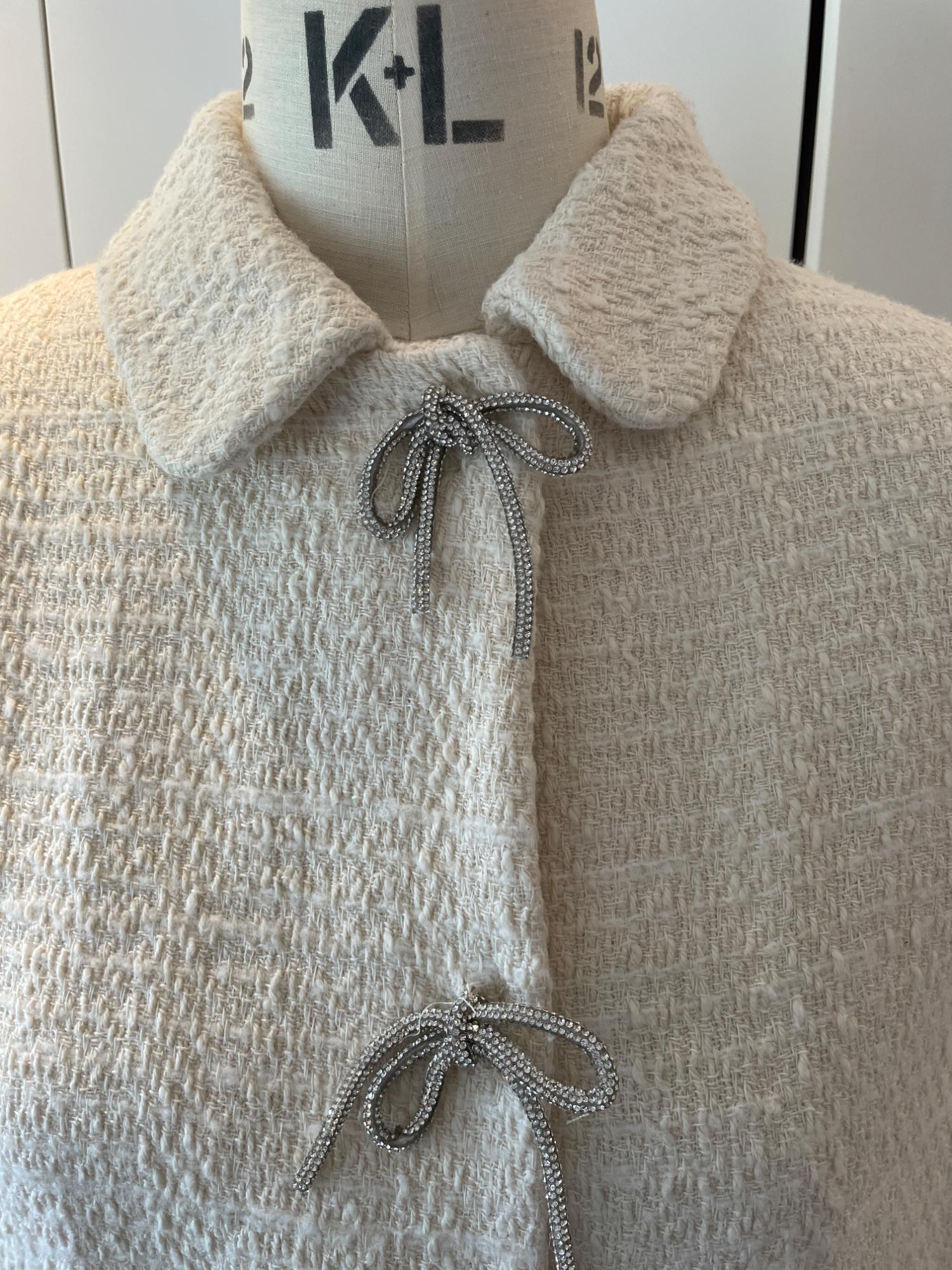 TEXTURED JACKET WITH BOW BUTTON