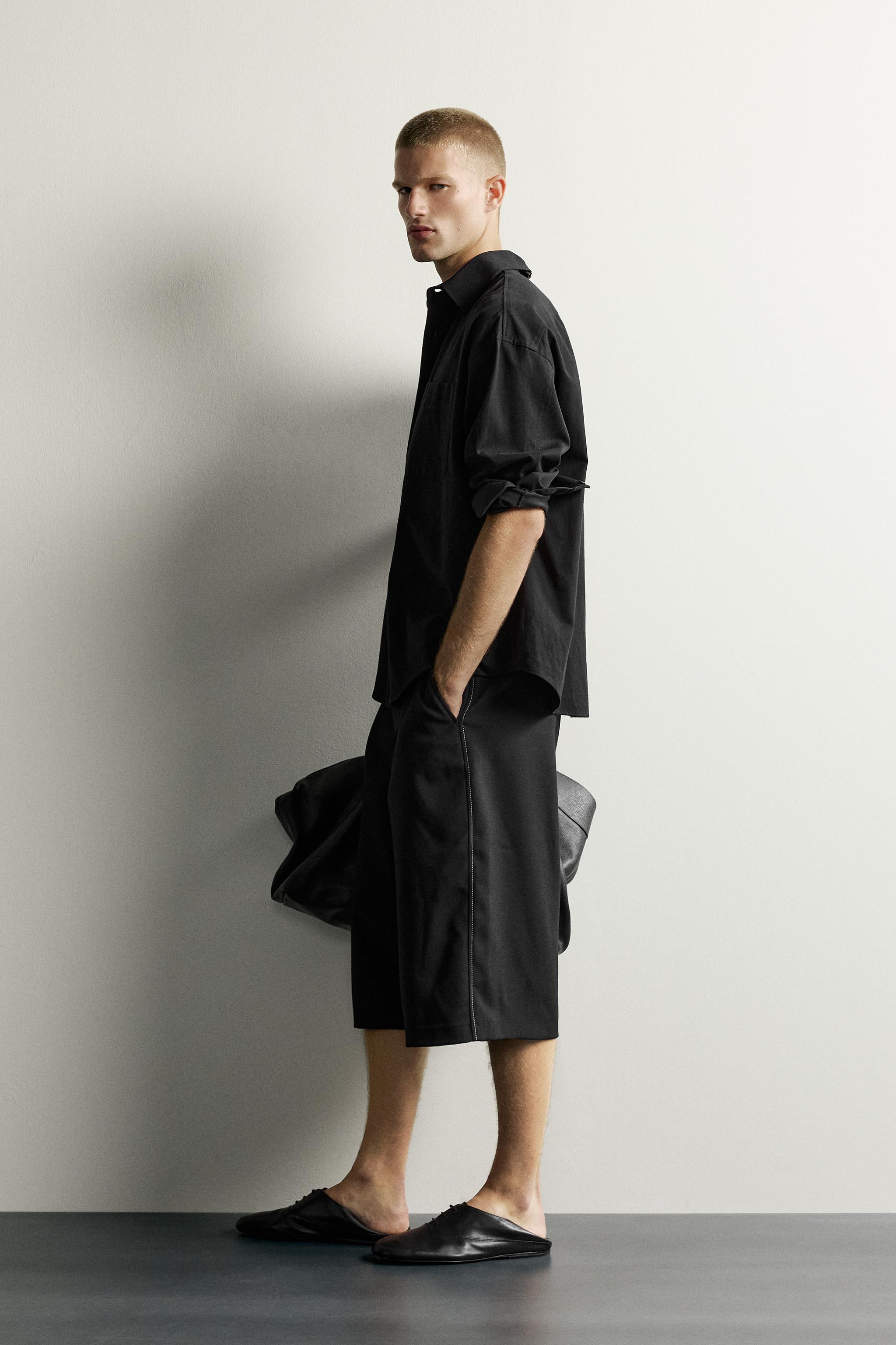 WIDE FIT PLEATED BERMUDA SHORTS