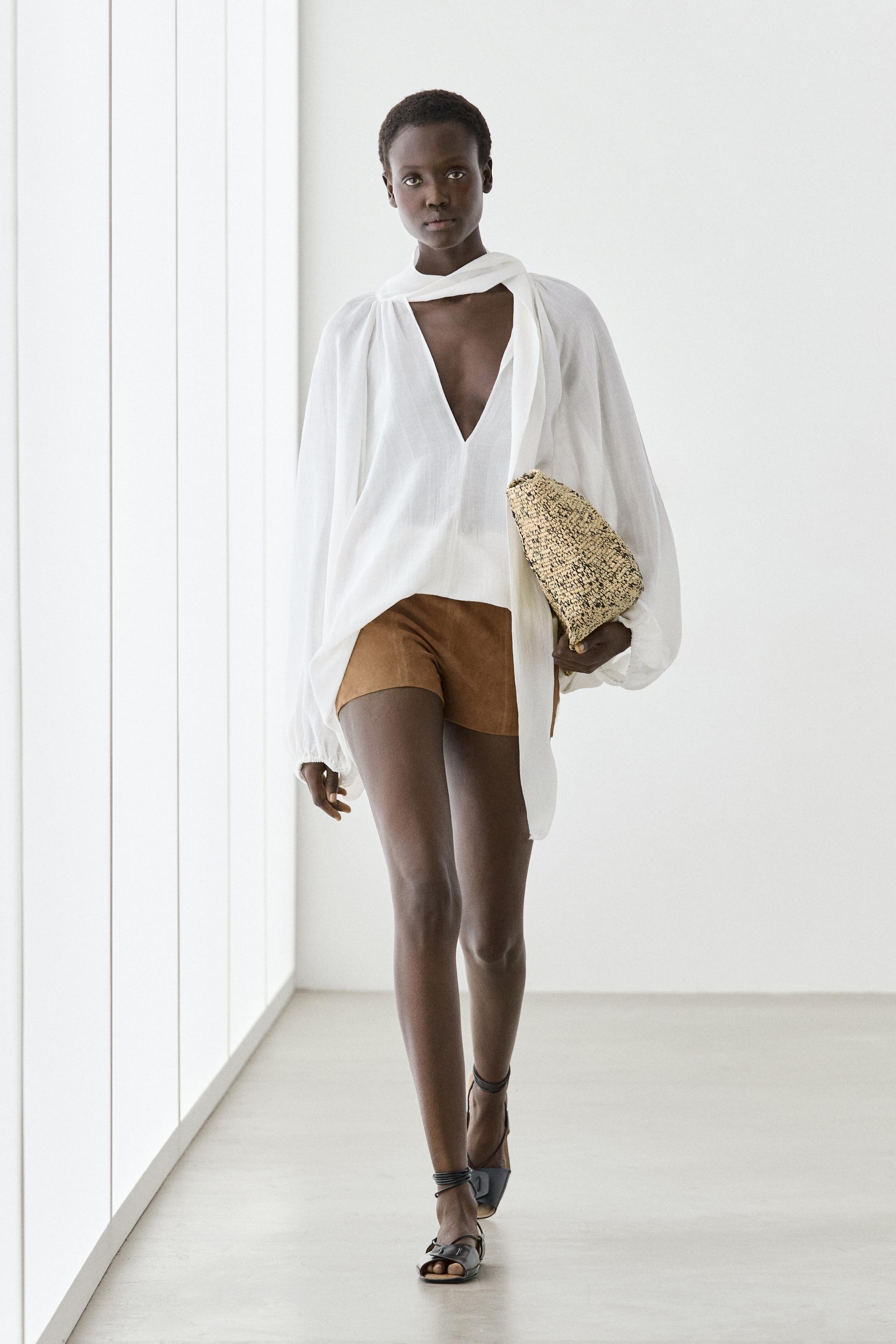 Flowing V-neck blouse with tie — White