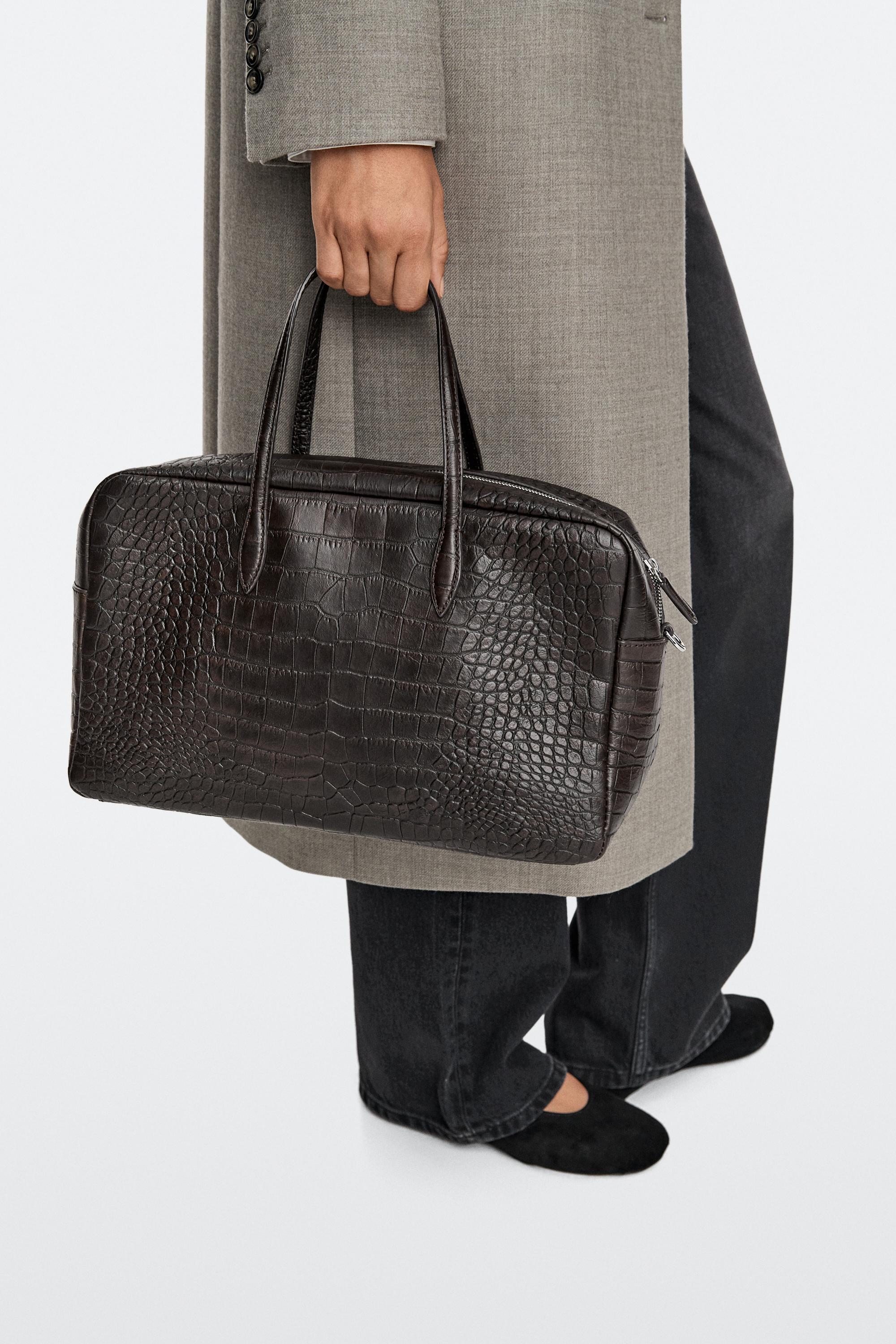 Medium leather textured duffle bag