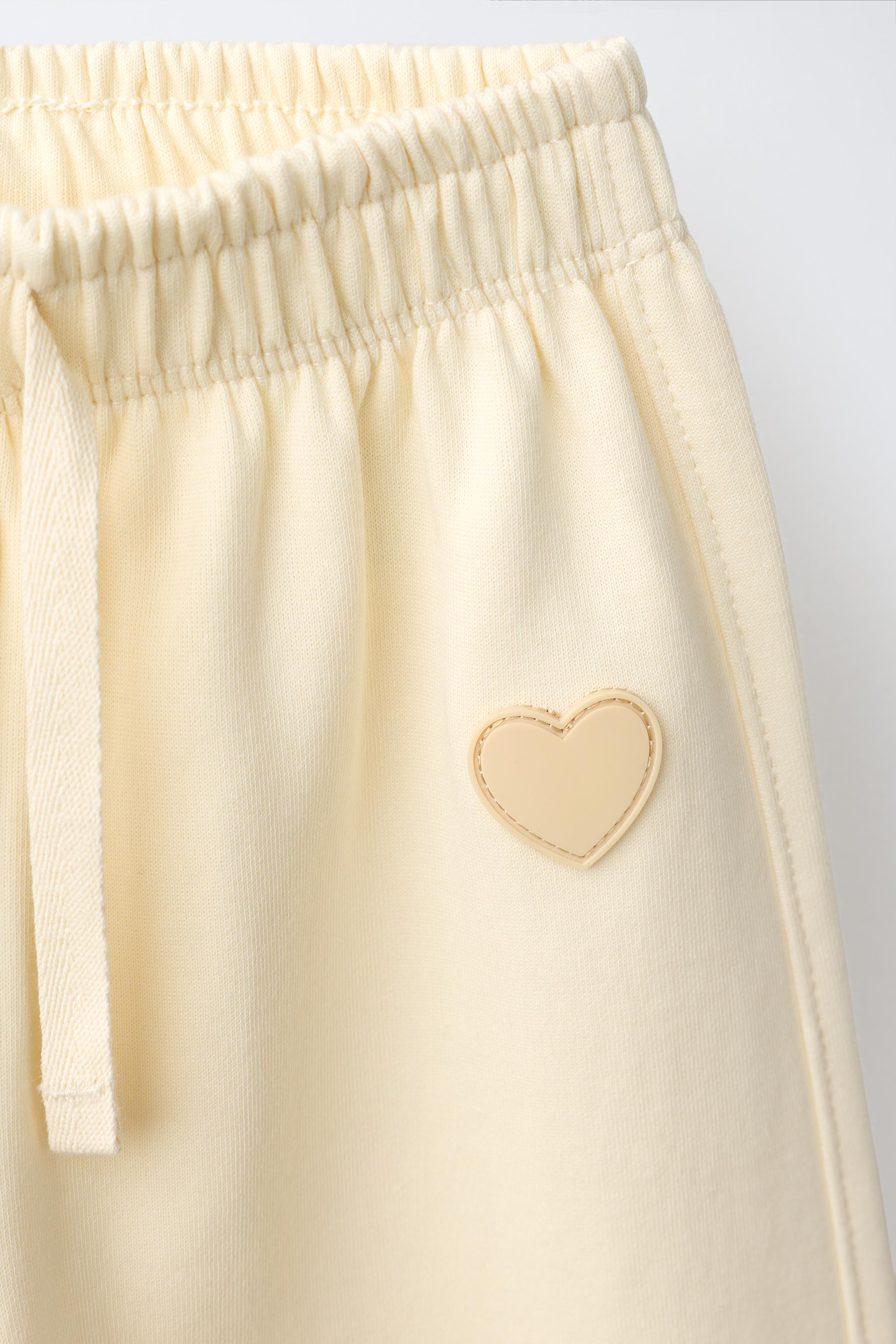 RUBBERIZED HEART INTERLOCK BARREL PANTS