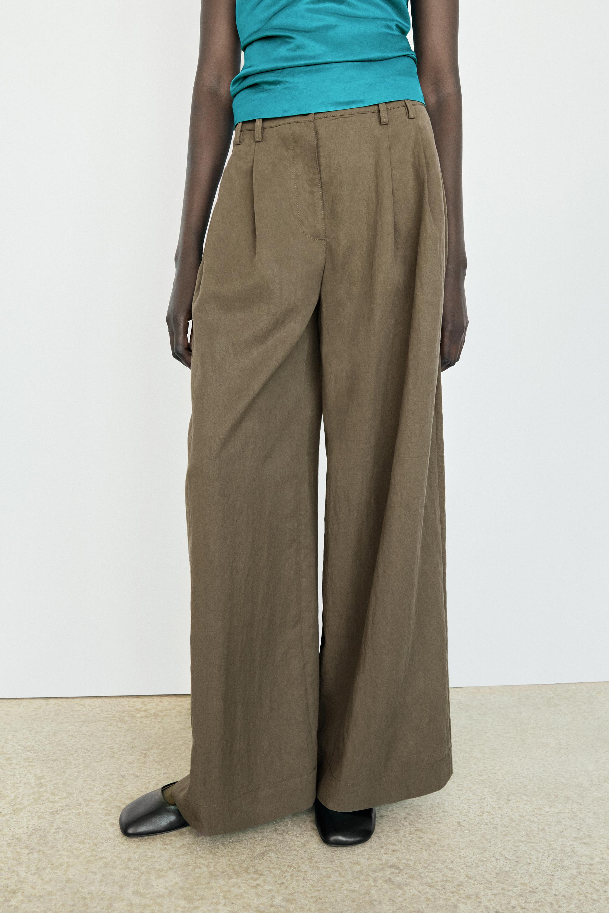Technical wide-leg pleated pants