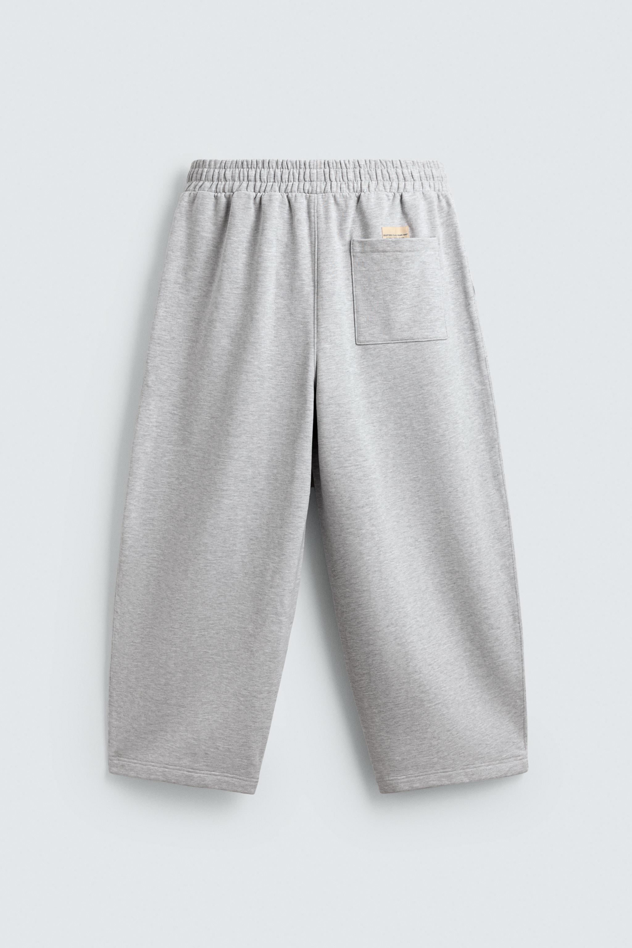 PANTALON DE JOGGING COUPE BALLON AVEC PIÈCE