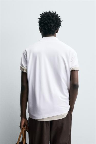 TECHNICAL PIQUÉ TEXTURED POLO SHIRT - White by Zara