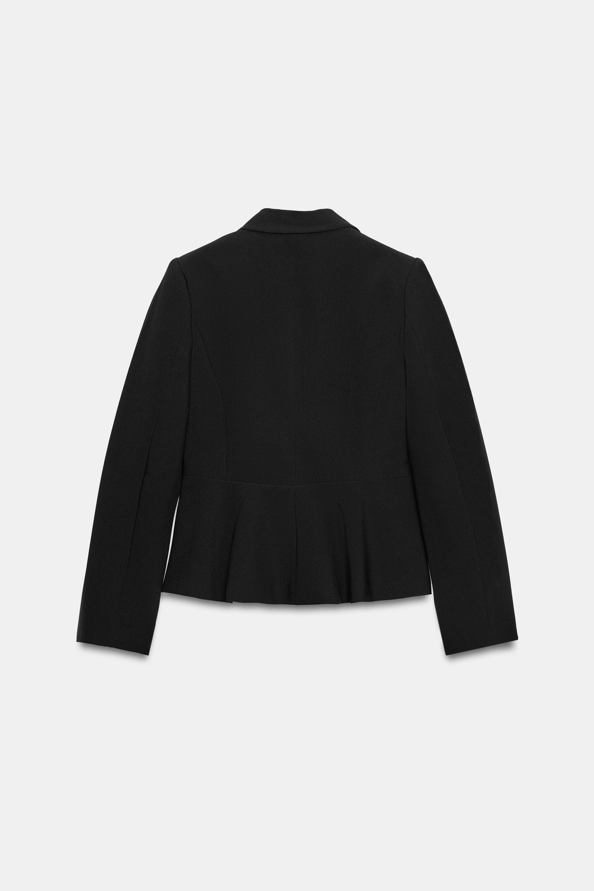 VESTE PEPLUM À ÉPAULETTES