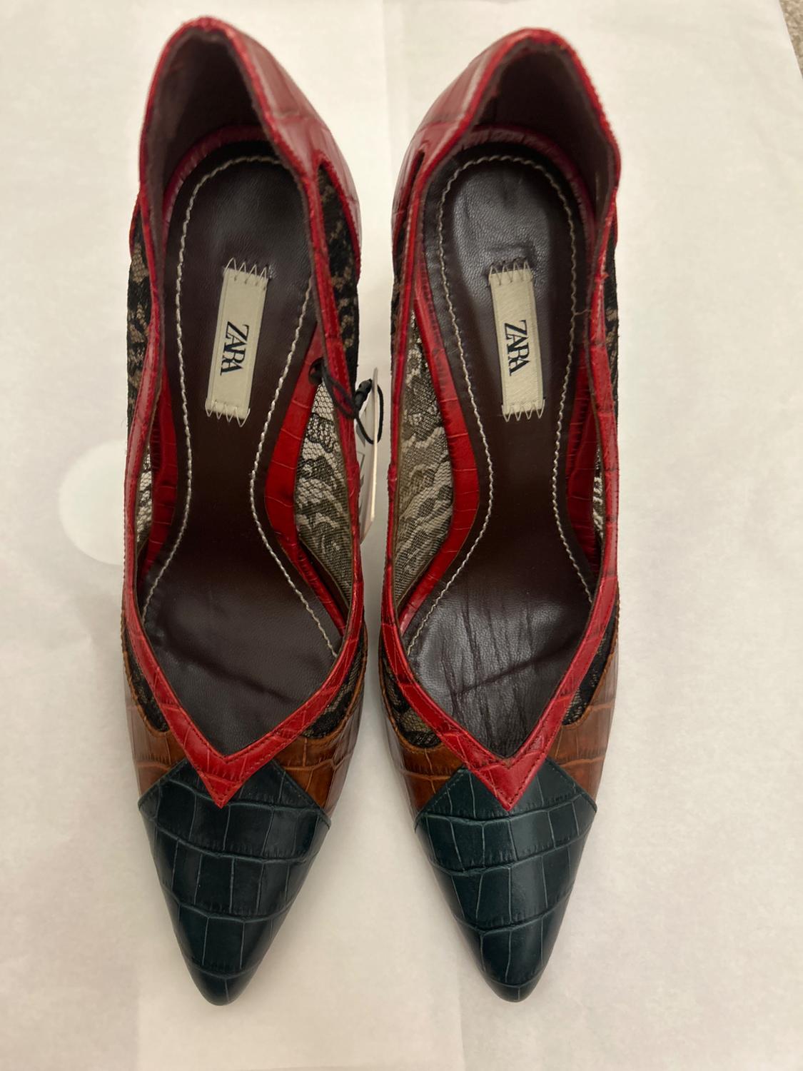 Zara high heels with a pointed toe design in black, brown, and red textured leather, with lace details and visible stitching.