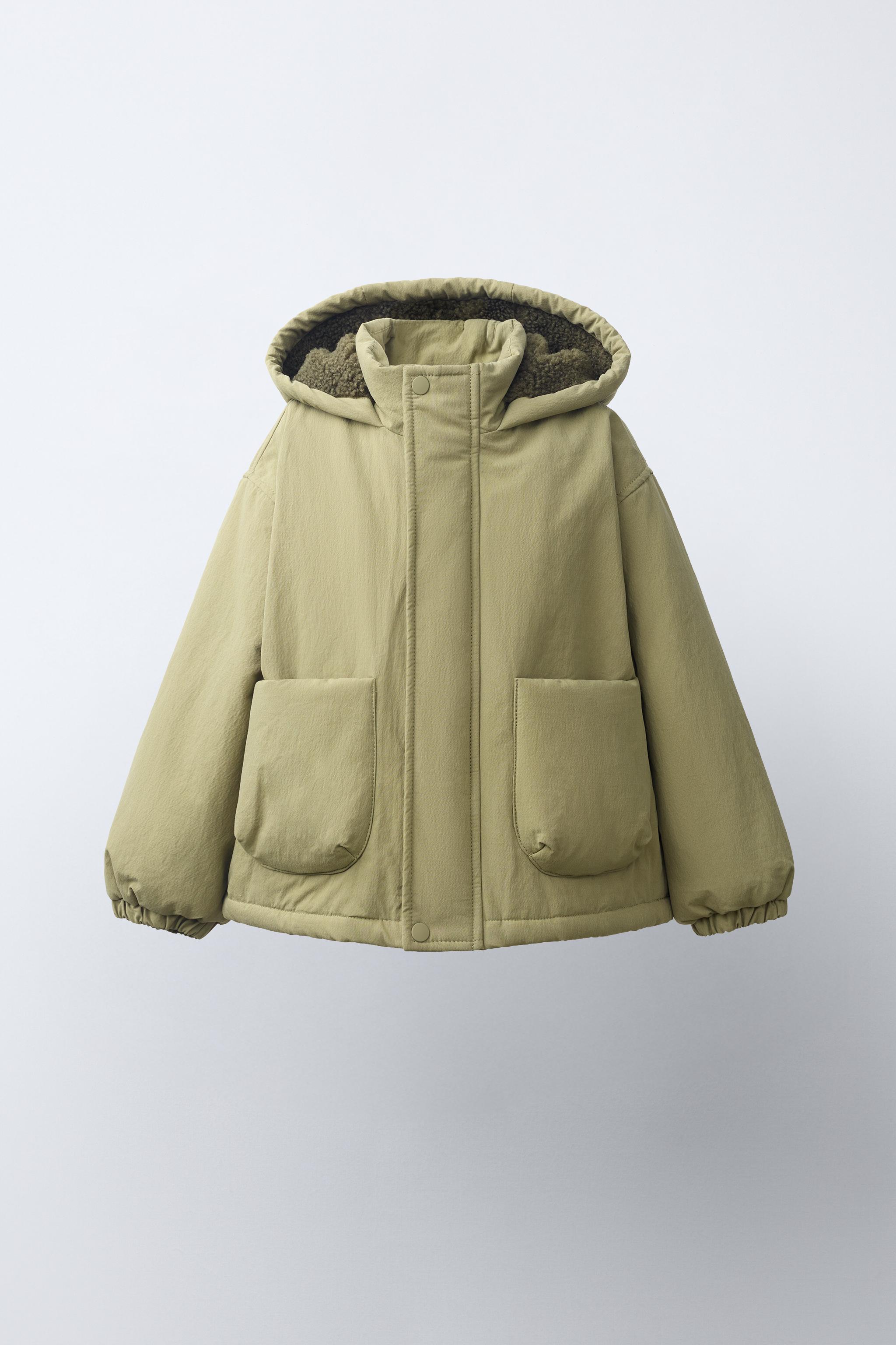 BLOUSON À CAPUCHE EFFET MOUTON