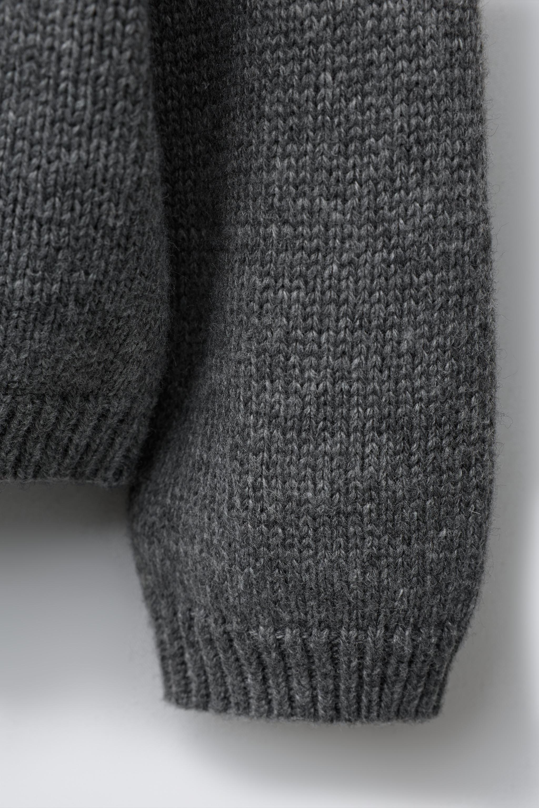 PULL EN MAILLE AVEC NŒUD VELOURS