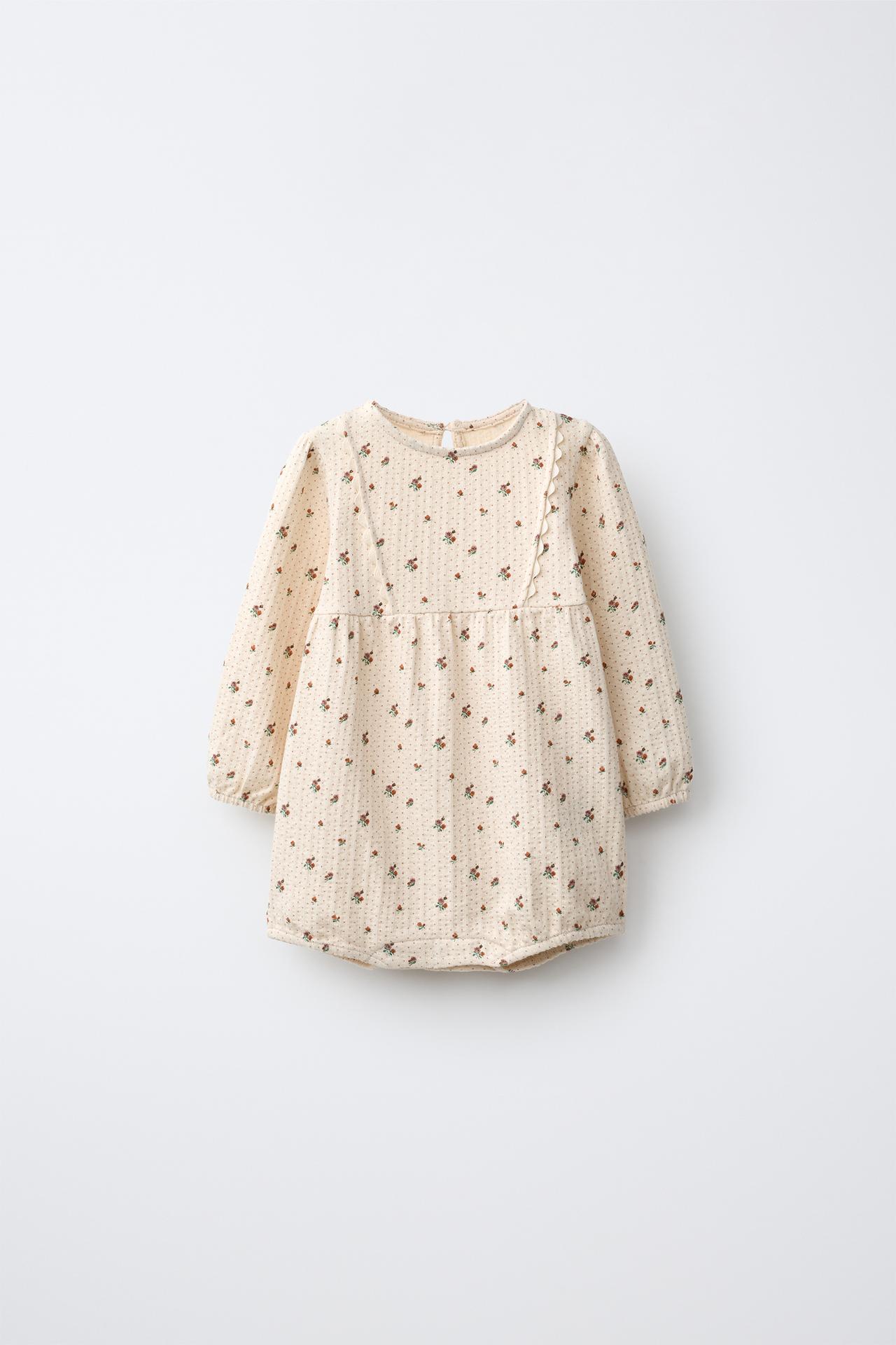 TEXTURED FLORAL ROMPER — Ecru