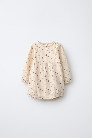 TEXTURED FLORAL ROMPER — Ecru 1